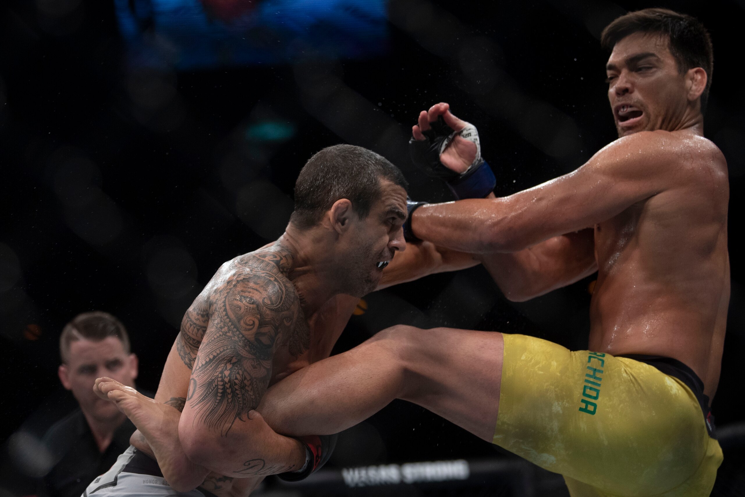 Brazilian fighter Vitor Belfort (L) competes against Brazilian fighter Lyoto Machida (R) during their middleweight bout at the Ultimate Fighting Championship 224 (UFC 224) event at Jeunesse Arena in Rio de Janeiro, Brazil, on May 12, 2018. (Photo by MAURO