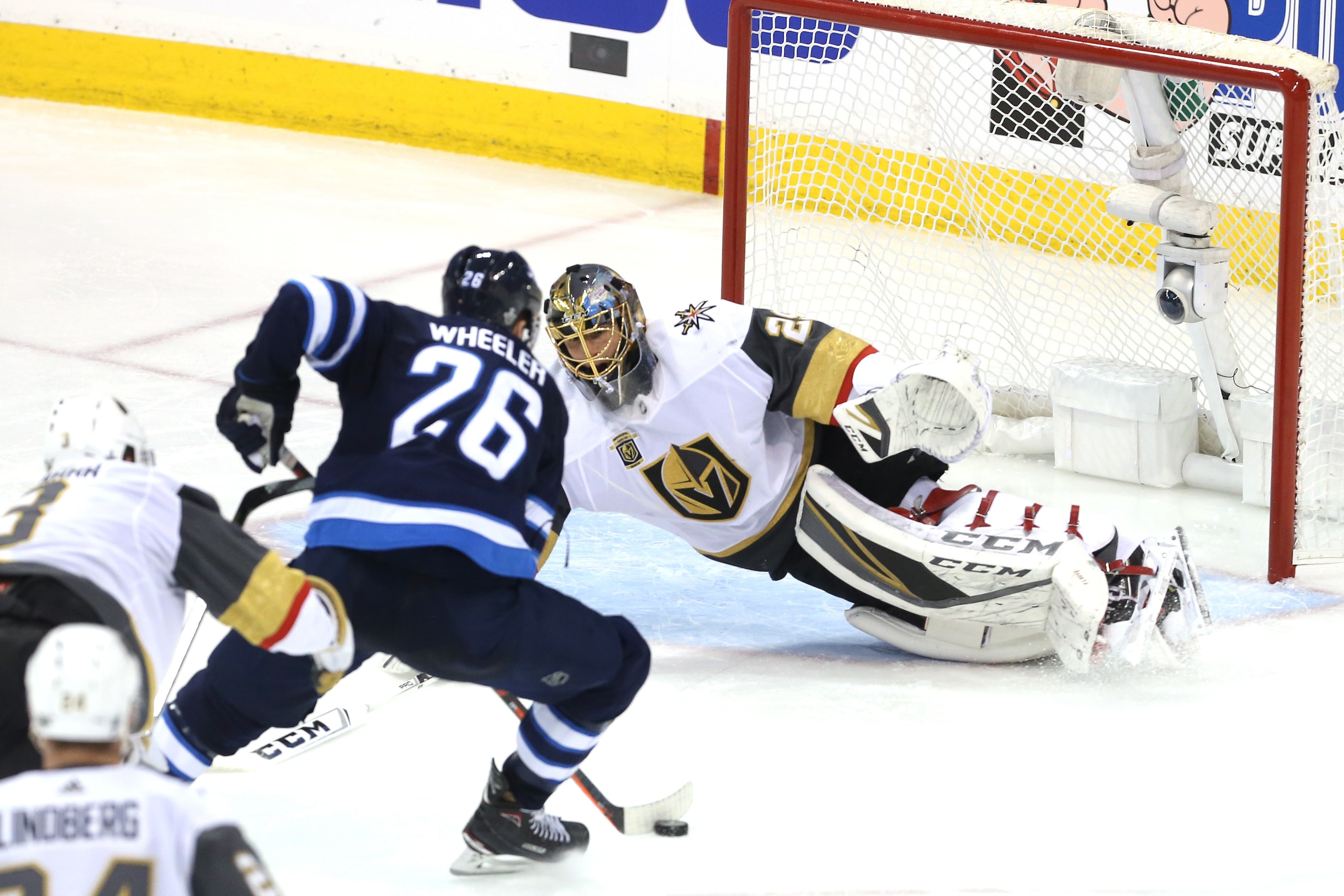 WINNIPEG, MB - MAY 12: Marc-Andre Fleury #29 of the Vegas Golden Knights defends the net against Blake Wheeler #26 of the Winnipeg Jets in Game One of the Western Conference Finals during the 2018 NHL Stanley Cup Playoffs at Bell MTS Place on May 12, 2018