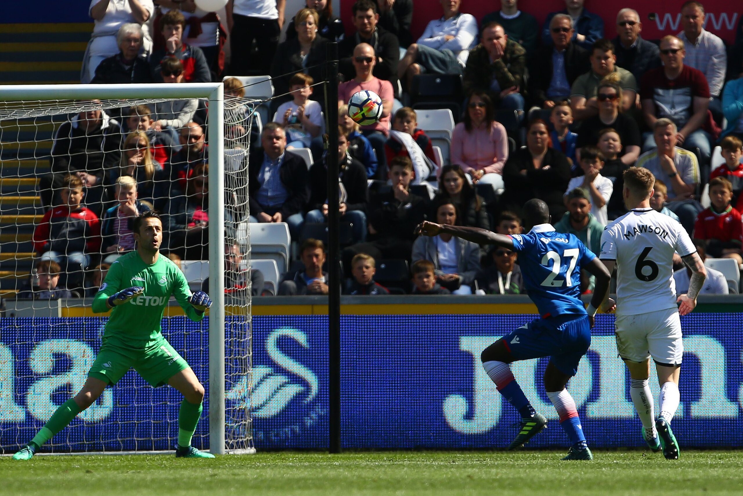 Stoke City's Senegalese defender Badou Ndiaye (C) shoots and scores past Swansea City's Polish goalkeeper Lukasz Fabianski during the English Premier League football match between Swansea City and Stoke City at The Liberty Stadium in Swansea, south Wales 