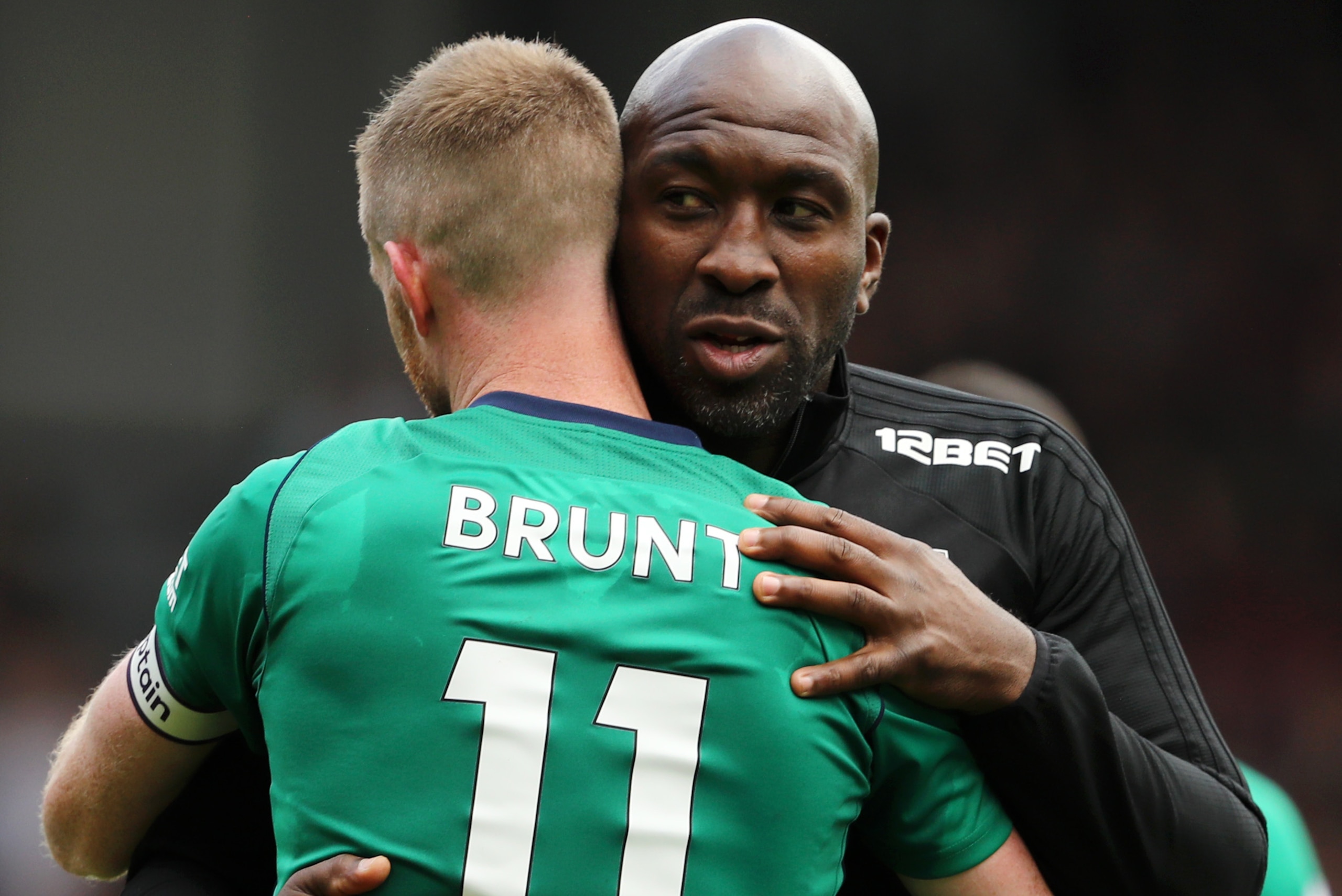 LONDON, ENGLAND - MAY 13:  Darren Moore, Caretaker Manager of West Bromwich Albion embraces Chris Brunt of West Bromawich Albion after the Premier League match between Crystal Palace and West Bromwich Albion at Selhurst Park on May 13, 2018 in London, Eng