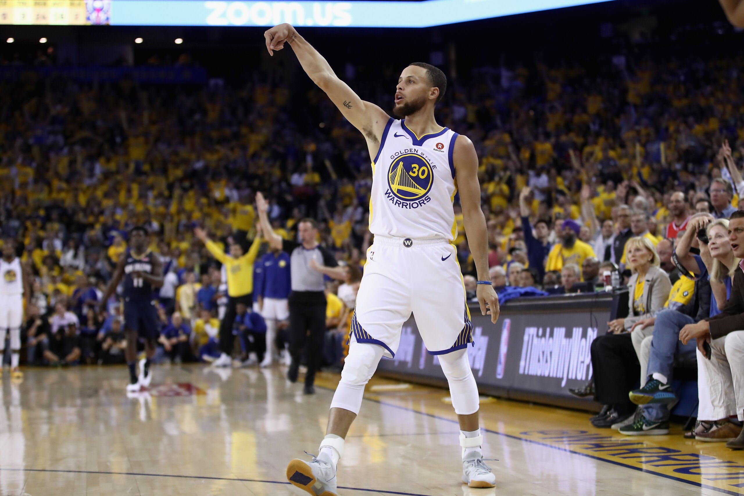 OAKLAND, CA - MAY 08:  Stephen Curry #30 of the Golden State Warriors reacts after making a basket against the New Orleans Pelicans during Game Five of the Western Conference Semifinals of the 2018 NBA Playoffs at ORACLE Arena on May 8, 2018 in Oakland, C