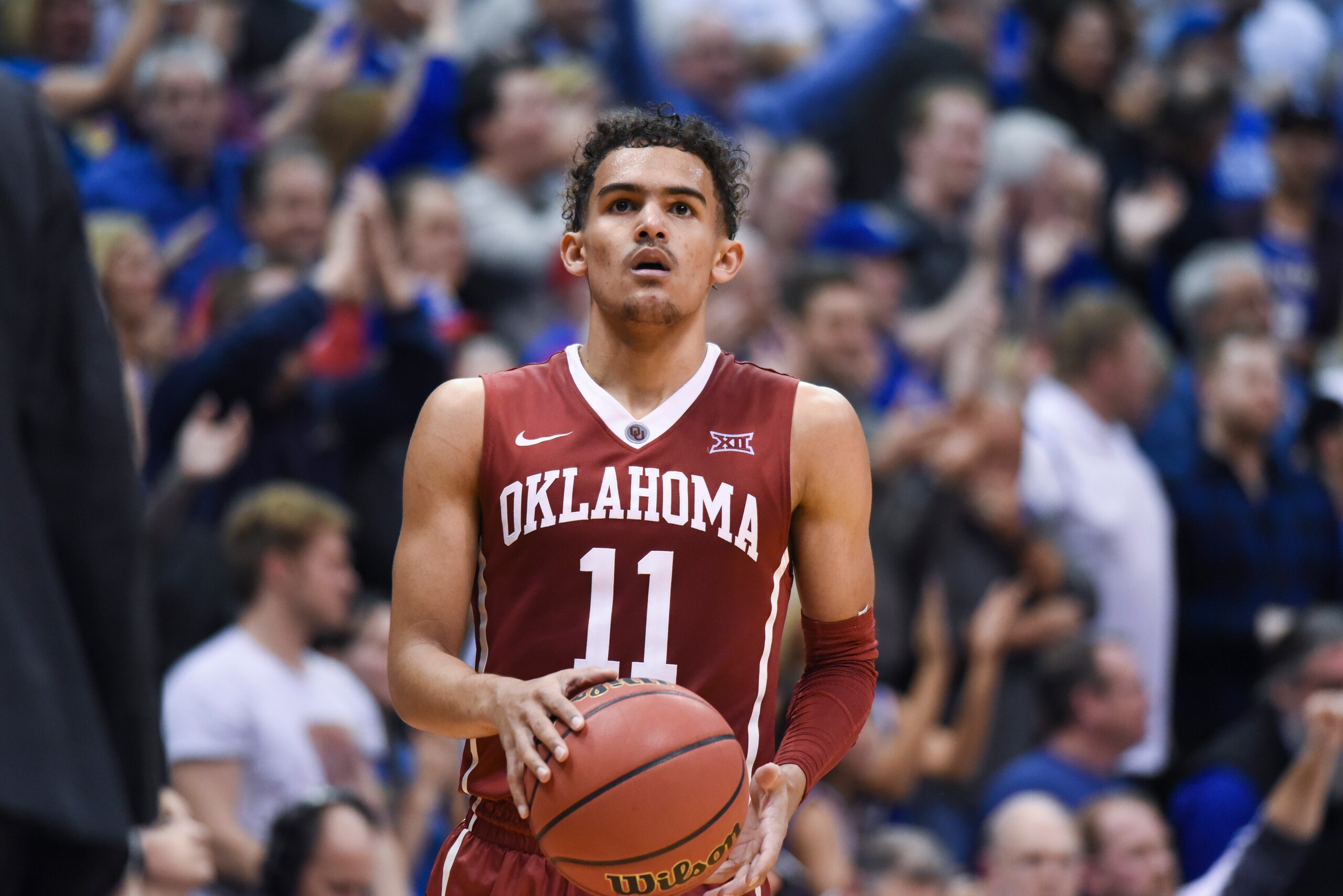 LAWRENCE, KS - FEBRUARY 19: Trae Young #11 of the Oklahoma Sooners in action against the Kansas Jayhawks at Allen Fieldhouse on February 19, 2018 in Lawrence, Kansas. (Photo by Ed Zurga/Getty Images)