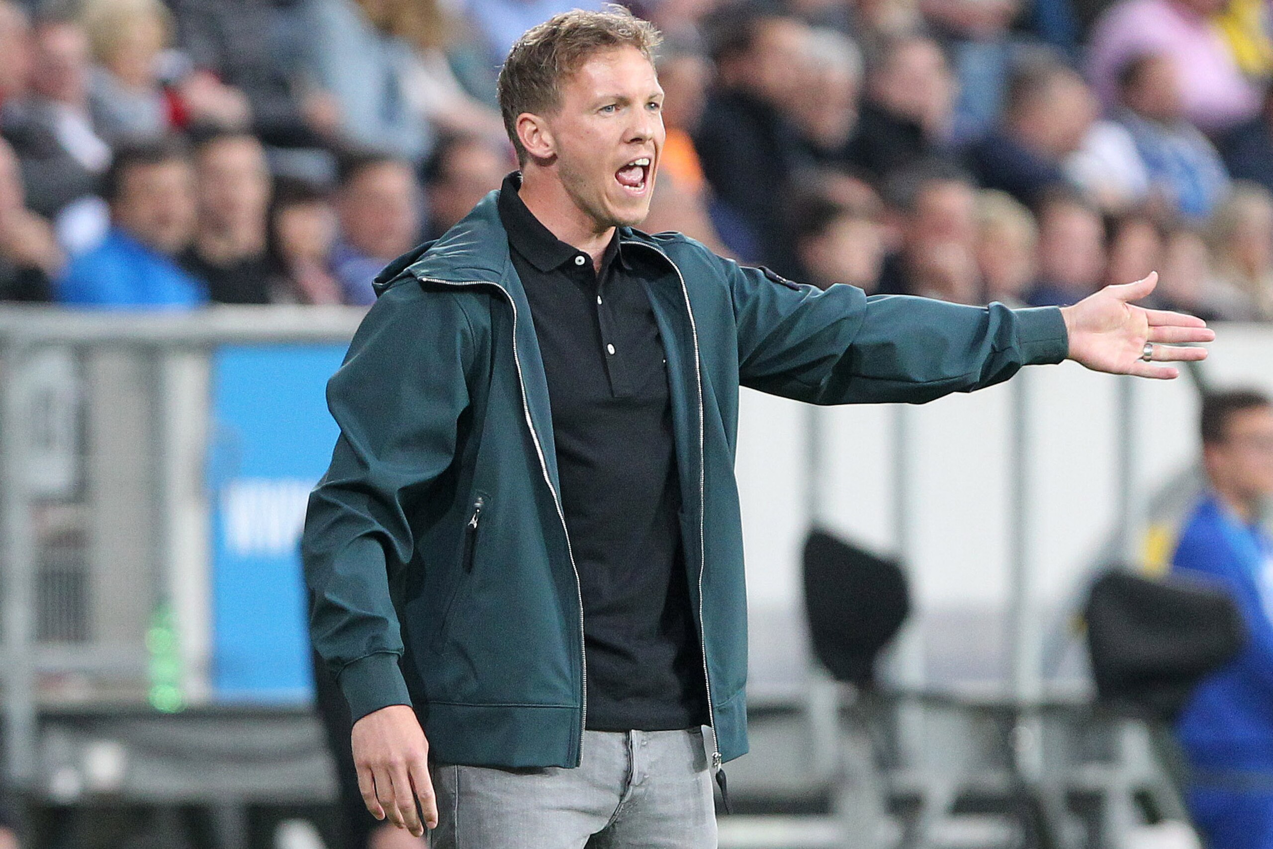 Hoffenheim's German head coach Julian Nagelsmann reacts during the German First division Bundesliga football match TSG 1899 Hoffenheim vs Hanover 96 in Sinsheim, southern Germany on April 27, 2018. (Photo by Daniel ROLAND / AFP) / RESTRICTIONS: DURING MAT