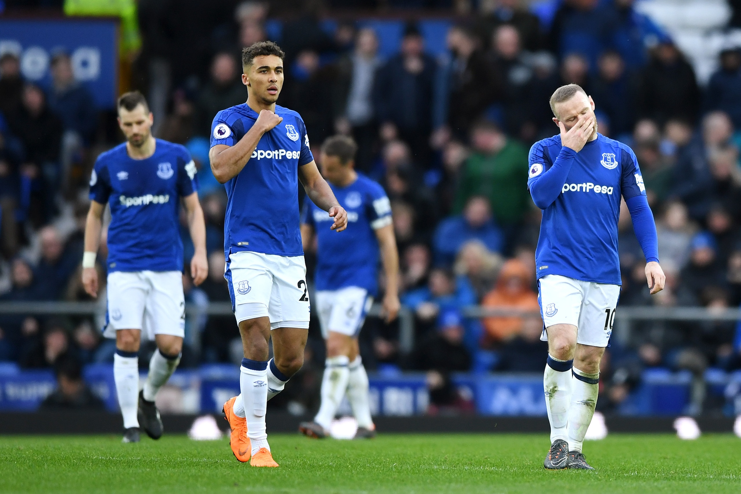 LIVERPOOL, ENGLAND - MARCH 31:  Dominic Calvert-Lewin of Everton and Wayne Rooney of Everton look dejected during the Premier League match between Everton and Manchester City at Goodison Park on March 31, 2018 in Liverpool, England.  (Photo by Gareth Copl
