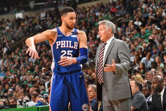 BOSTON, MA - MAY 9: Ben Simmons #25 and Head Coach Brett Brown of the Philadelphia 76ers talk during the game against the Boston Celtics during Game Five of the Eastern Conference Semifinals of the 2018 NBA Playoffs on May 9, 2018 at the TD Garden in Bost