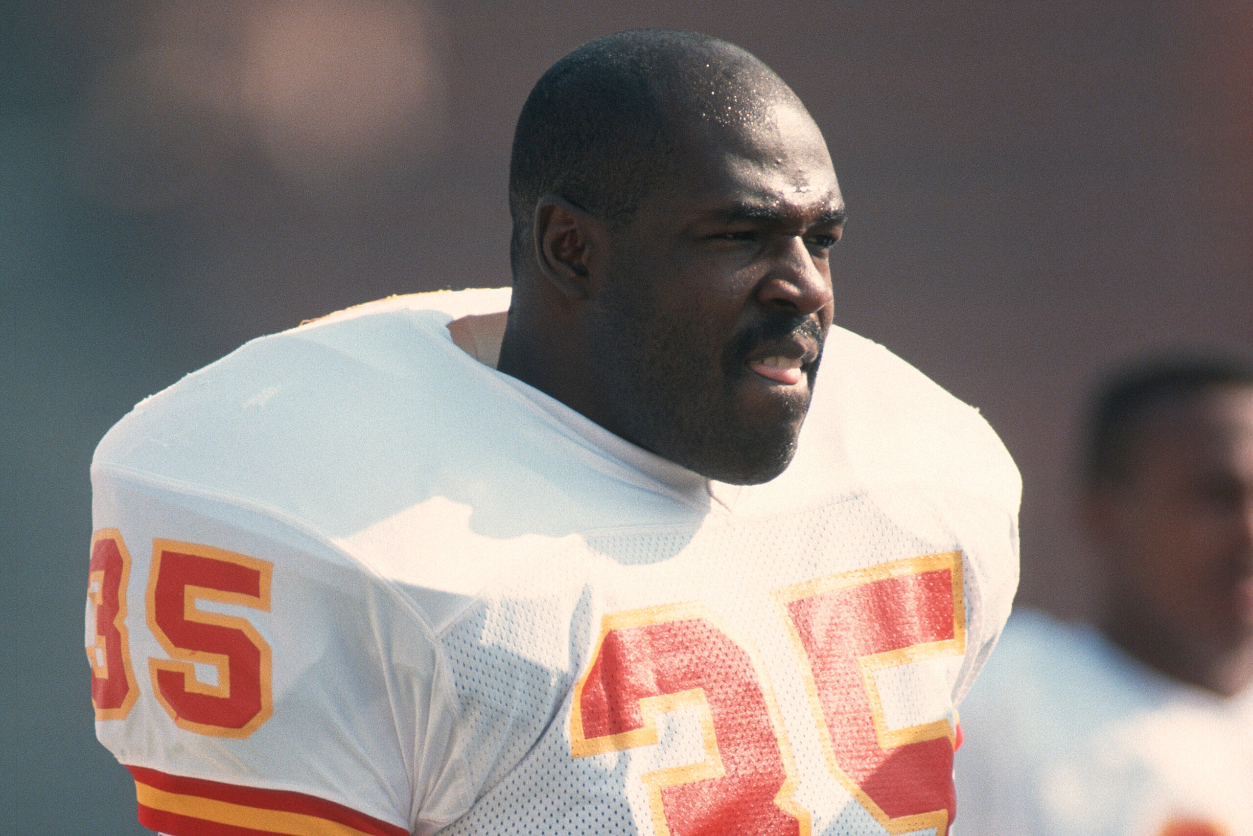 LOS ANGELES, CA - NOVEMBER 25:  Christian Okoye #35 of the Kansas City Chiefs looks on against the Los Angeles Raiders during an NFL football game November 25, 1990 at the Los Angeles Memorial Coliseum in Los Angeles, California. Okoye played for the Chie
