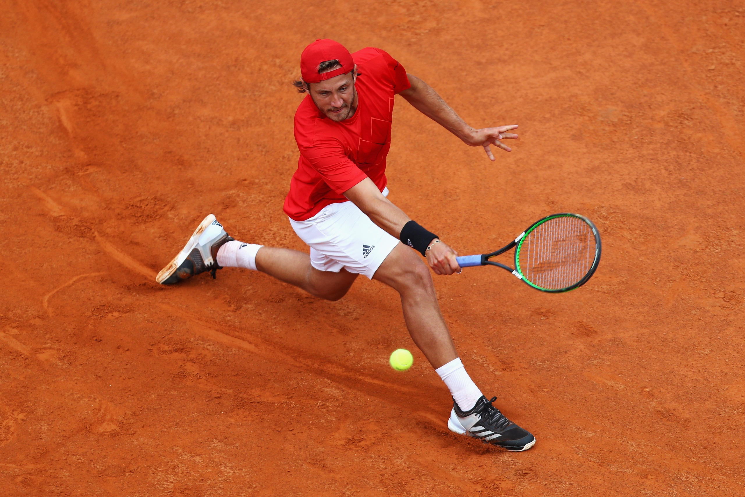 ROME, ITALY - MAY 15:  Lucas Pouille of France returns a backhand in his match against Andreas Seppi of Italy during day 3 of the Internazionali BNL d'Italia 2018 tennis at Foro Italico on May 15, 2018 in Rome, Italy.  (Photo by Dean Mouhtaropoulos/Getty 