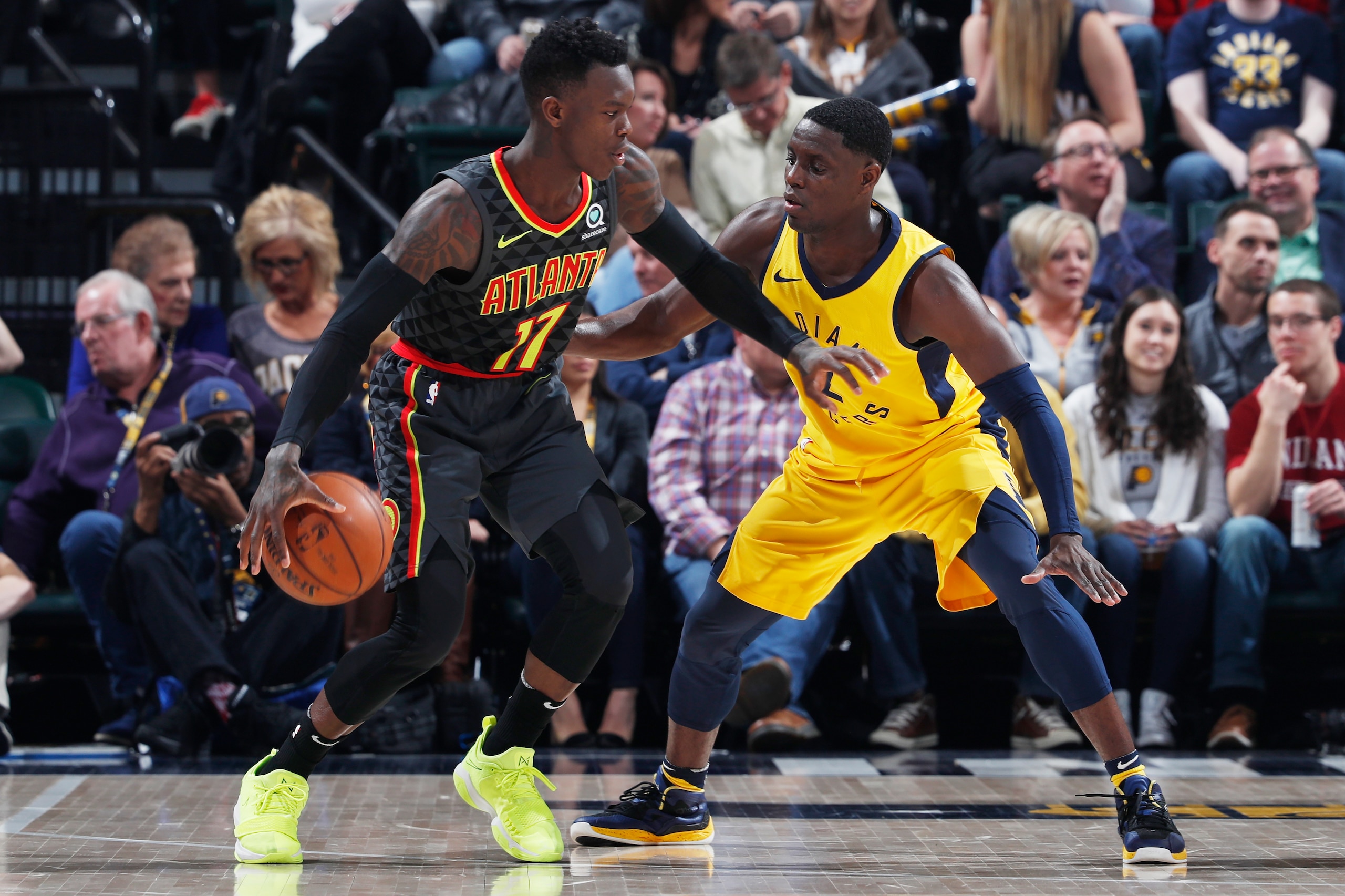 INDIANAPOLIS, IN - MARCH 09: Dennis Schroder #17 of the Atlanta Hawks handles the ball against Darren Collison #2 of the Indiana Pacers during a game at Bankers Life Fieldhouse on March 9, 2018 in Indianapolis, Indiana. The Pacers won 112-87. NOTE TO USER