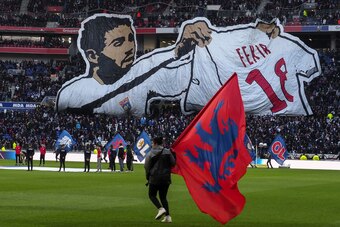 Lyon's supporters hold a banner featuring Lyon's French midfielder Nabil Fekir prior to the French L1 football match Olympique Lyonnais (OL) versus AS Saint-Etienne (ASSE) on February 25, 2018 at the Groupama Stadium in Decines-Charpieu, near Lyon, centra
