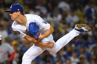 LOS ANGELES, CA - MAY 10:  Walker Buehler #21 of the Los Angeles Dodgers pitches in the game against the Cincinnati Reds at Dodger Stadium on May 10, 2018 in Los Angeles, California.  (Photo by Jayne Kamin-Oncea/Getty Images)