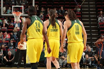 SEATTLE, WA - JUNE 24:  Jewell Loyd #24, Breanna Stewart #30, and Sue Bird #10 of the Seattle Storm during the game against the Connecticut Sun on June 24, 2016 at Key Arena in Seattle, Washington. NOTE TO USER: User expressly acknowledges and agrees that