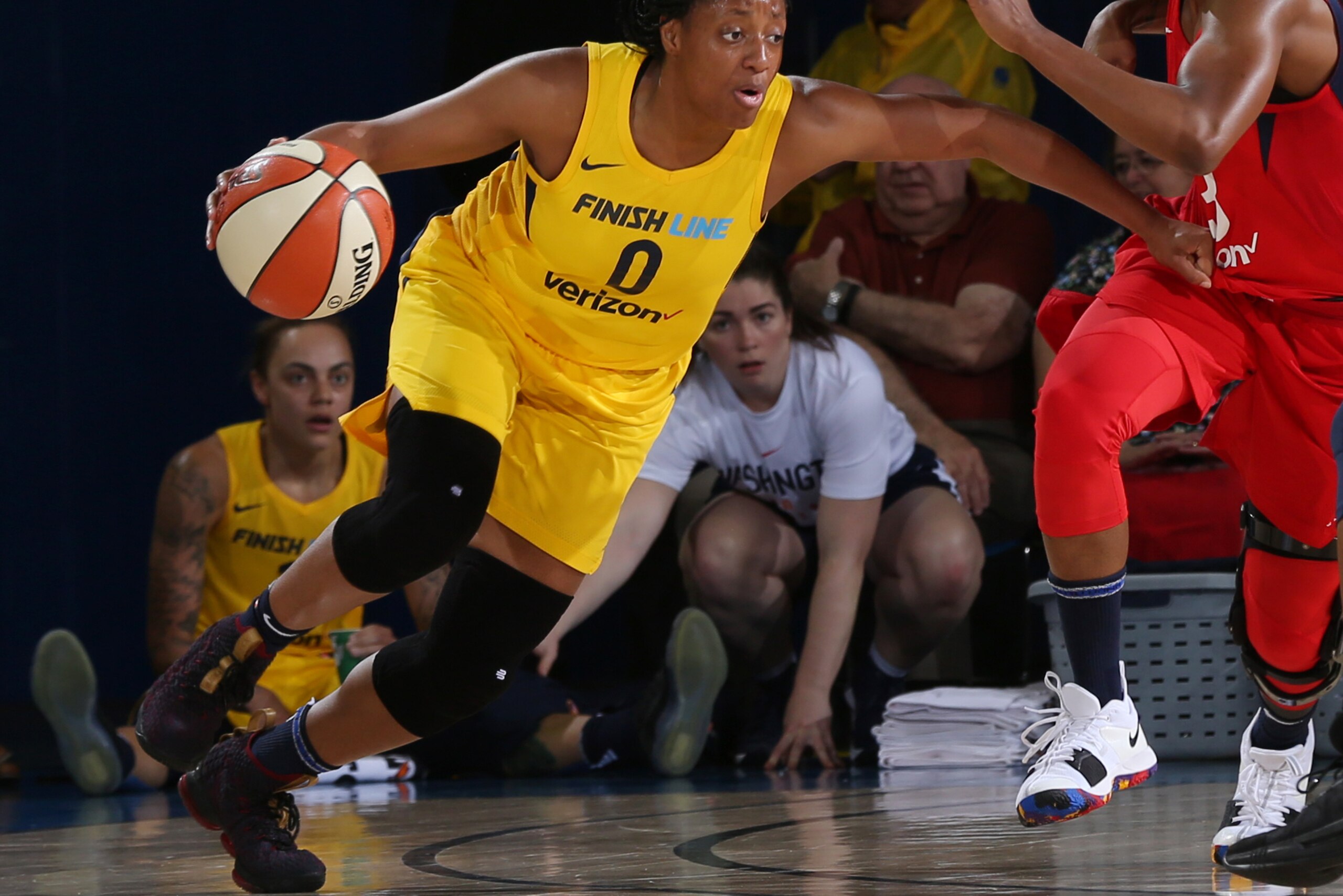 NEWARK, DELAWARE  -  MAY 12: Kelsey Mitchell #0 of the Indiana Fever handles the ball against the Washington Mystics  during a pre-season game on May 12, 2018 at the Bob Carpenter Center in Newark, DE. NOTE TO USER: User expressly acknowledges and agrees 