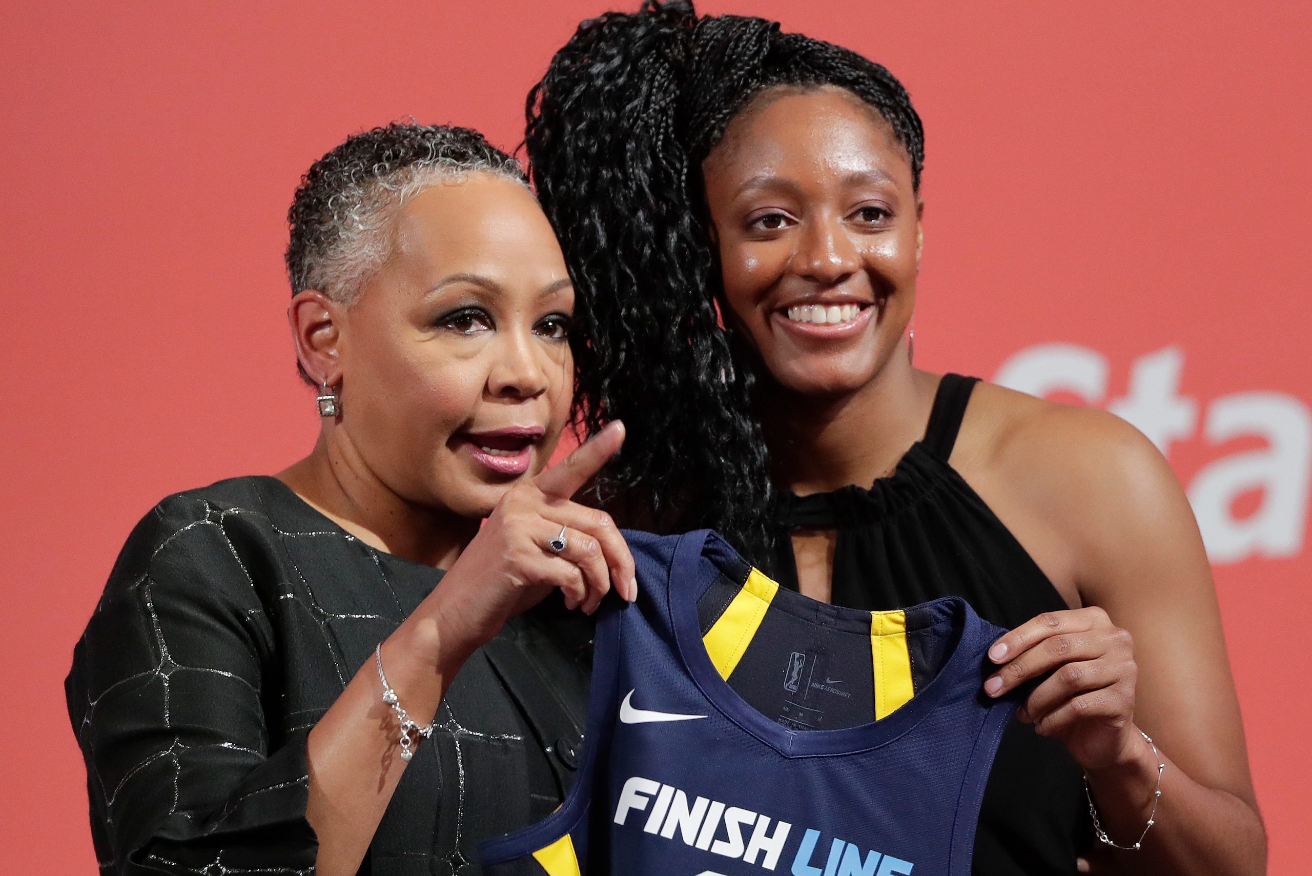 Kelsey Mitchell smiles after being drafted No. 2 overall.