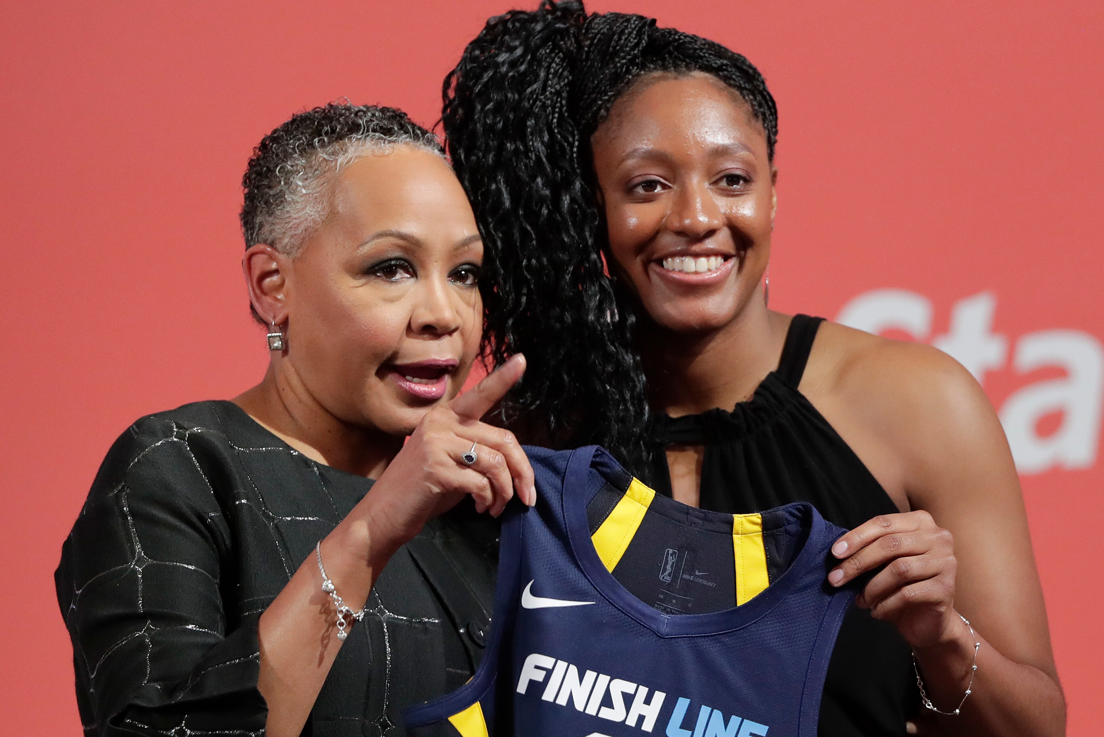 Kelsey Mitchell smiles after being drafted No. 2 overall.