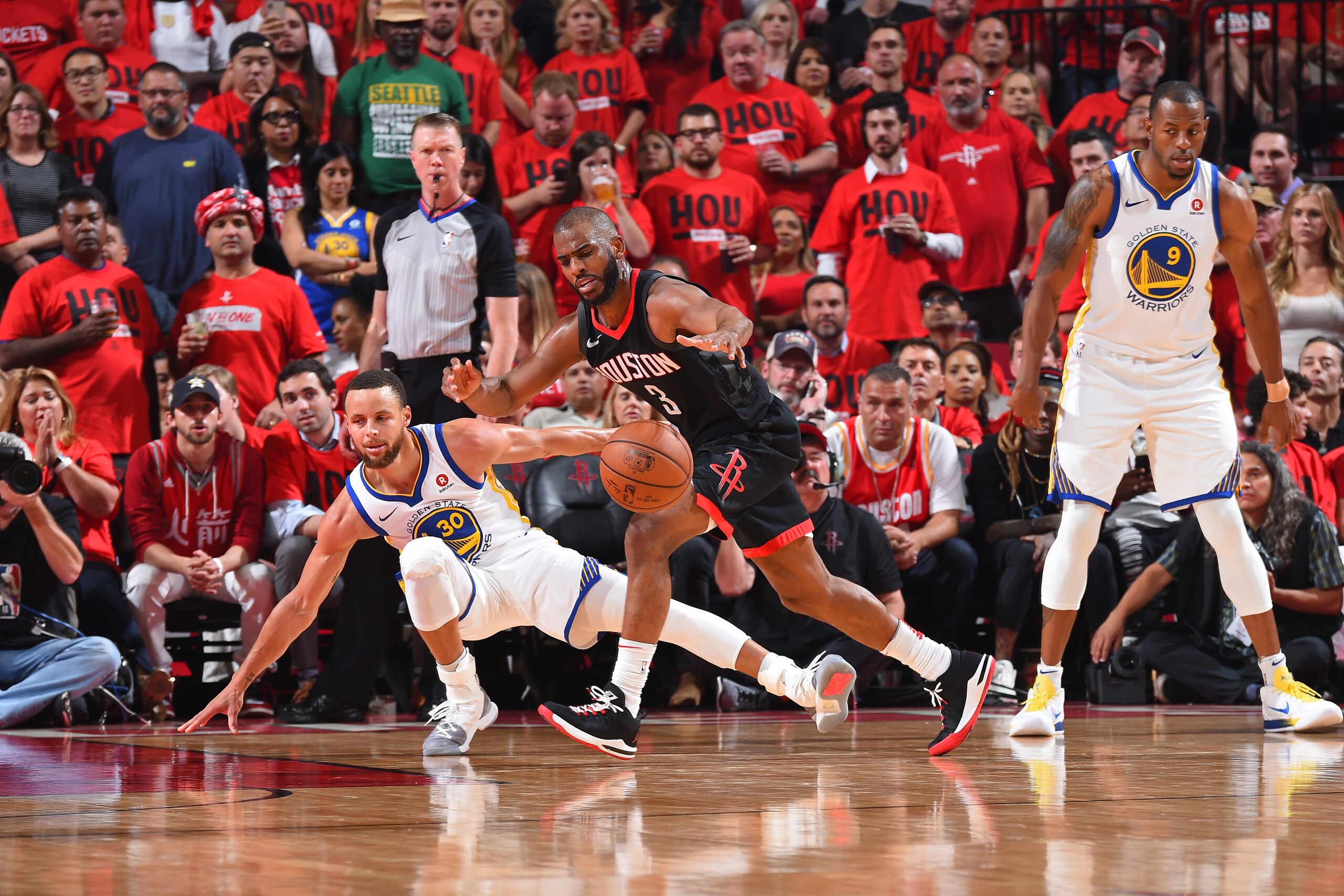 HOUSTON, TX - MAY 16: Chris Paul #3 of the Houston Rockets handles the ball against Stephen Curry #30 of the Golden State Warriors during Game Two of the Western Conference Finals of the 2018 NBA Playoffs on May 16, 2018 at the Toyota Center in Houston, T