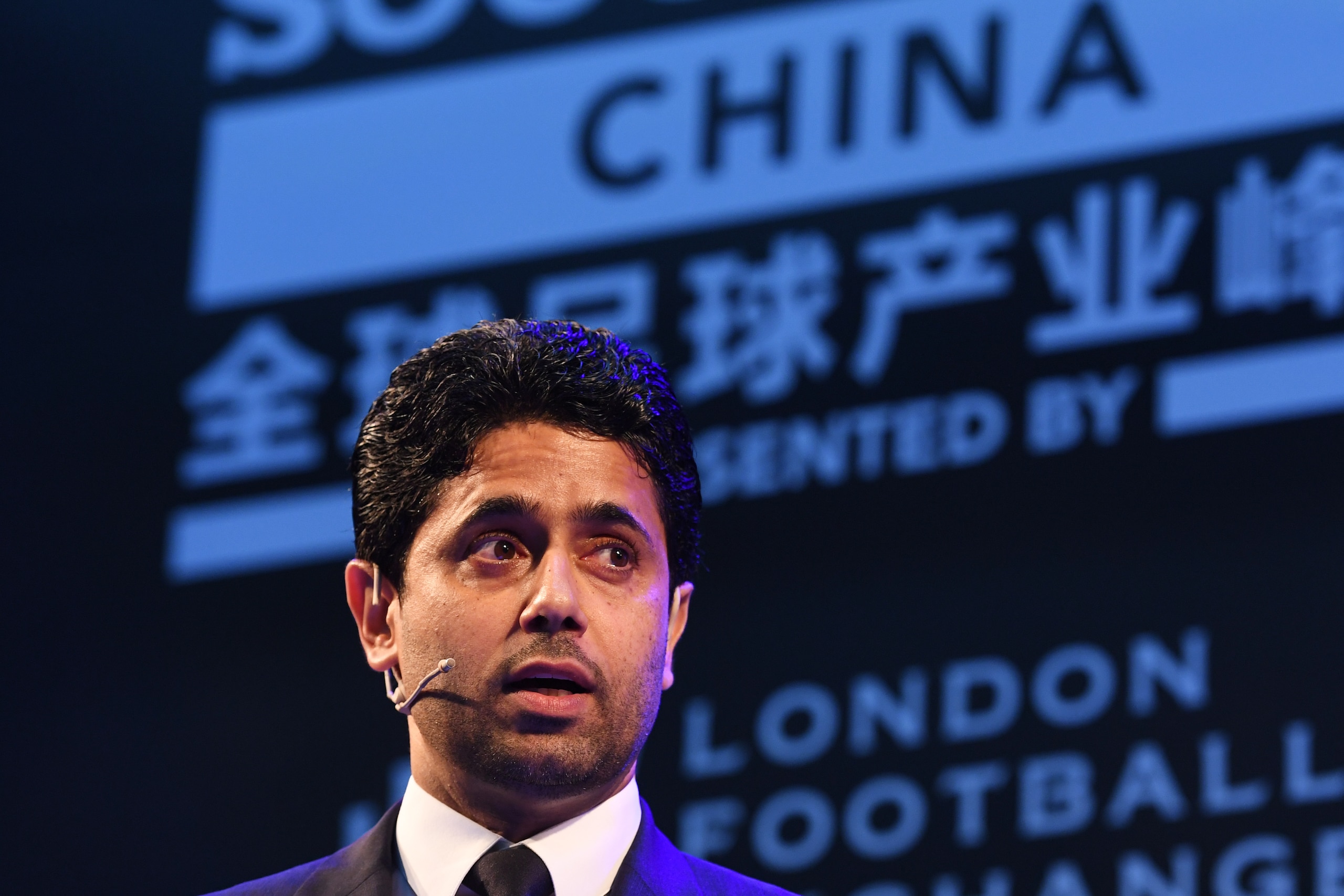 Paris Saint-Germain F.C. President Nasser Al-Khelaifi speaks during the launch of a strategic partnership between PSG and China's Desports, at the Soccerex China convention in Zhuhai, in China's southern Guangdong province on April 18, 2018. / AFP PHOTO /