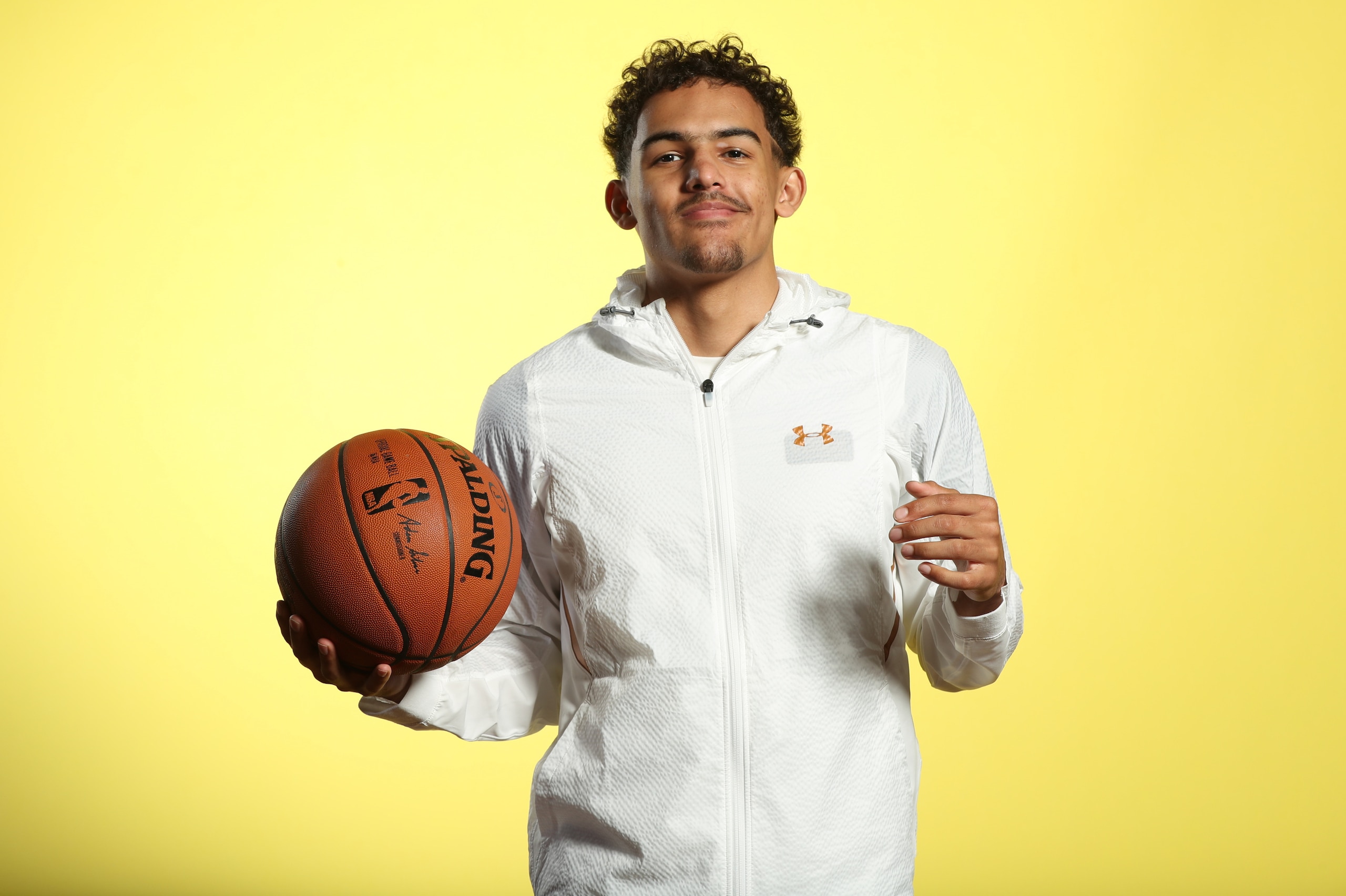 CHICAGO, IL - MAY 15: NBA Draft Prospect, Trae Young poses for a portrait during the 2018 NBA Combine circuit on May 15, 2018 at the Intercontinental Hotel Magnificent Mile in Chicago, Illinois. NOTE TO USER: User expressly acknowledges and agrees that, b CHICAGO, IL - MAY 15: NBA Draft Prospect, Trae Young poses for a portrait during the 2018 NBA Combine circuit on May 15, 2018 at the Intercontinental Hotel Magnificent Mile in Chicago, Illinois. NOTE TO USER: User expressly acknowledges and agrees that, b