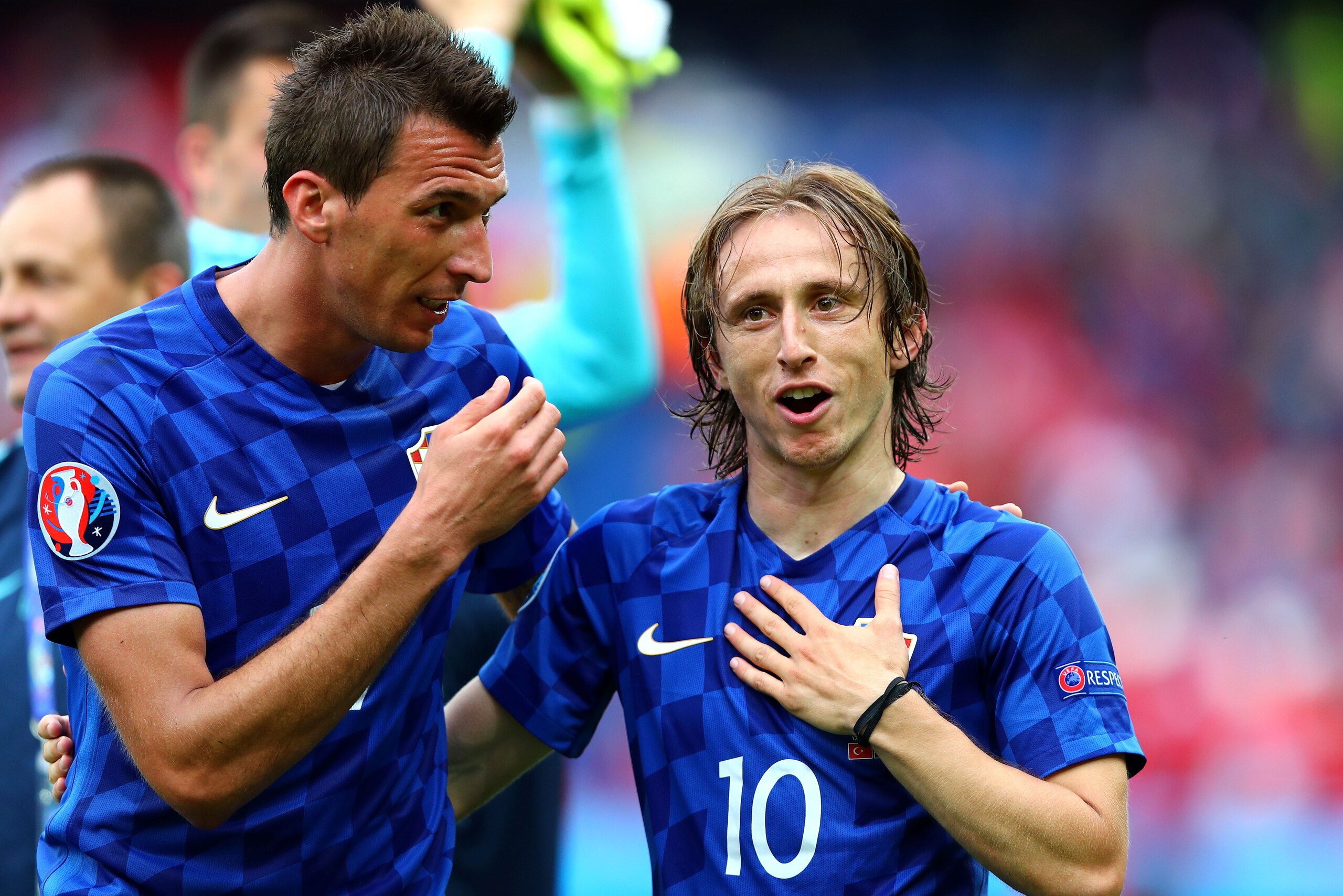 PARIS, FRANCE - JUNE 12:  Luka Modric (R) and Mario Mandzukic (L) of Croatia celebrate their team's 1-0 win in the UEFA EURO 2016 Group D match between Turkey and Croatia at Parc des Princes on June 12, 2016 in Paris, France.  (Photo by Clive Rose/Getty I