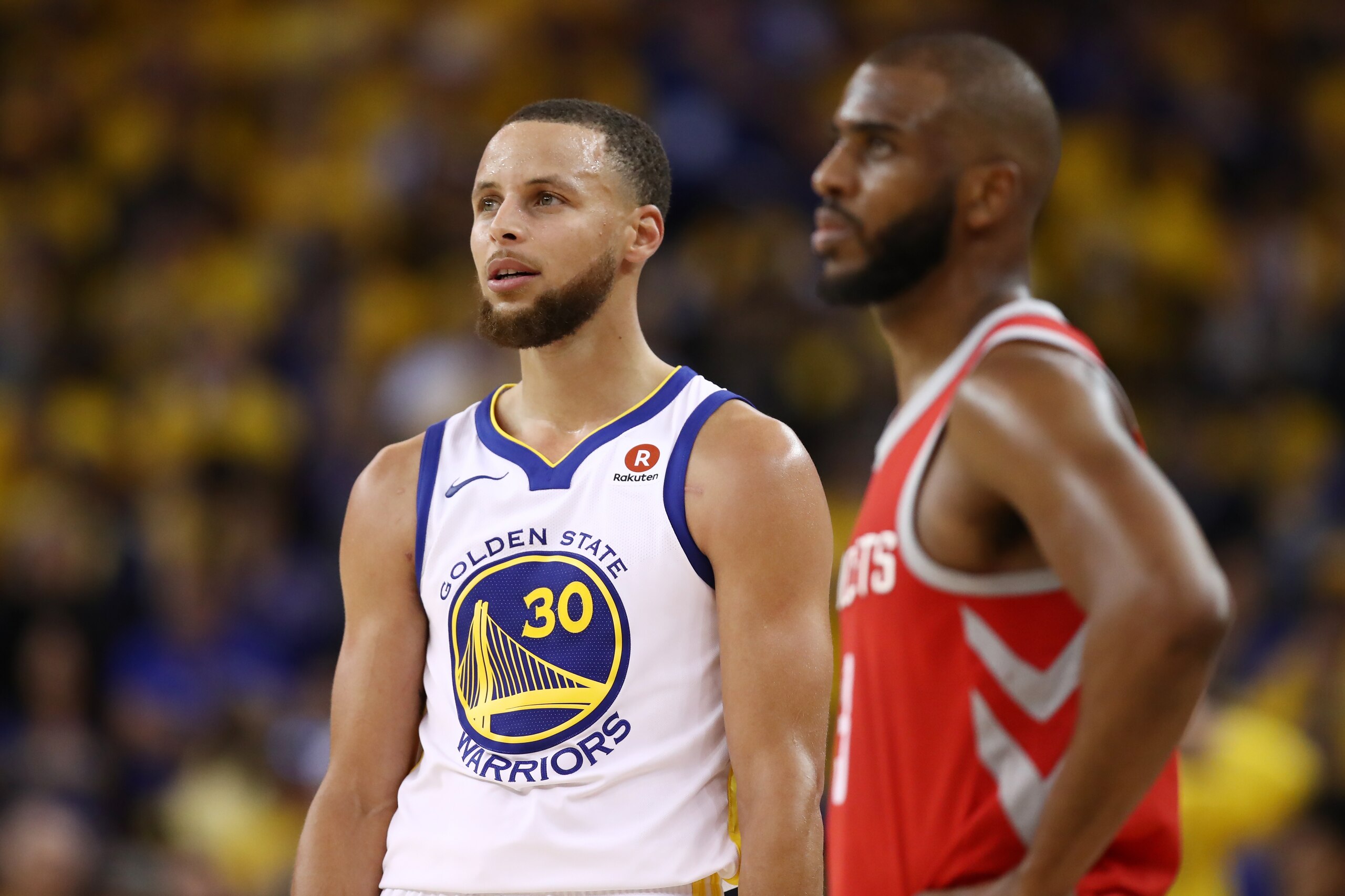 OAKLAND, CA - MAY 20:  Stephen Curry #30 of the Golden State Warriors and Chris Paul #3 of the Houston Rockets stand on the court during Game Three of the Western Conference Finals of the 2018 NBA Playoffs at ORACLE Arena on May 20, 2018 in Oakland, Calif