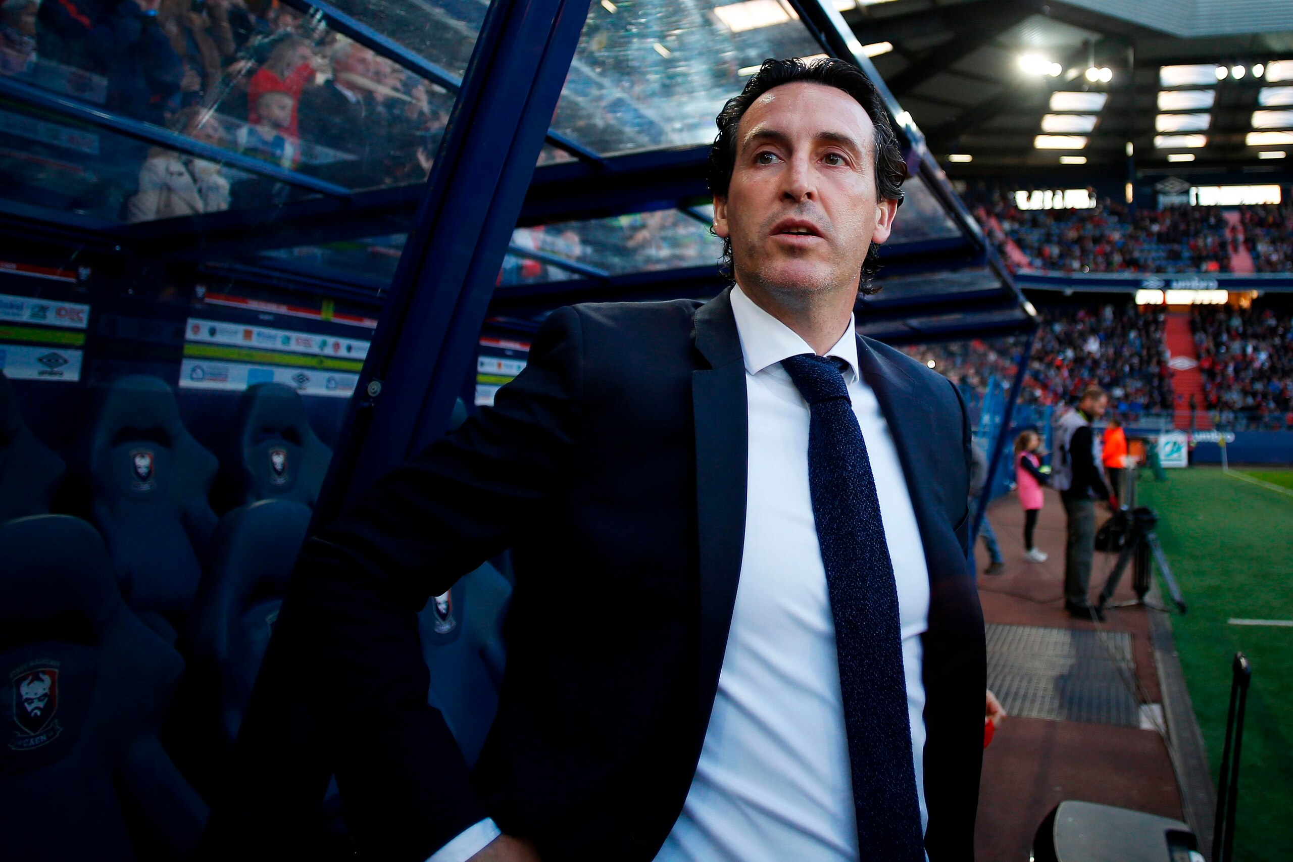 Paris Saint-Germain's Spanish headcoach Unai Emery looks on before the French L1 football match between Caen (SMC) and Paris (PSG) on May 19, 2018, at the Michel d'Ornano stadium, in Caen, northwestern France. (Photo by CHARLY TRIBALLEAU / AFP)        (Ph