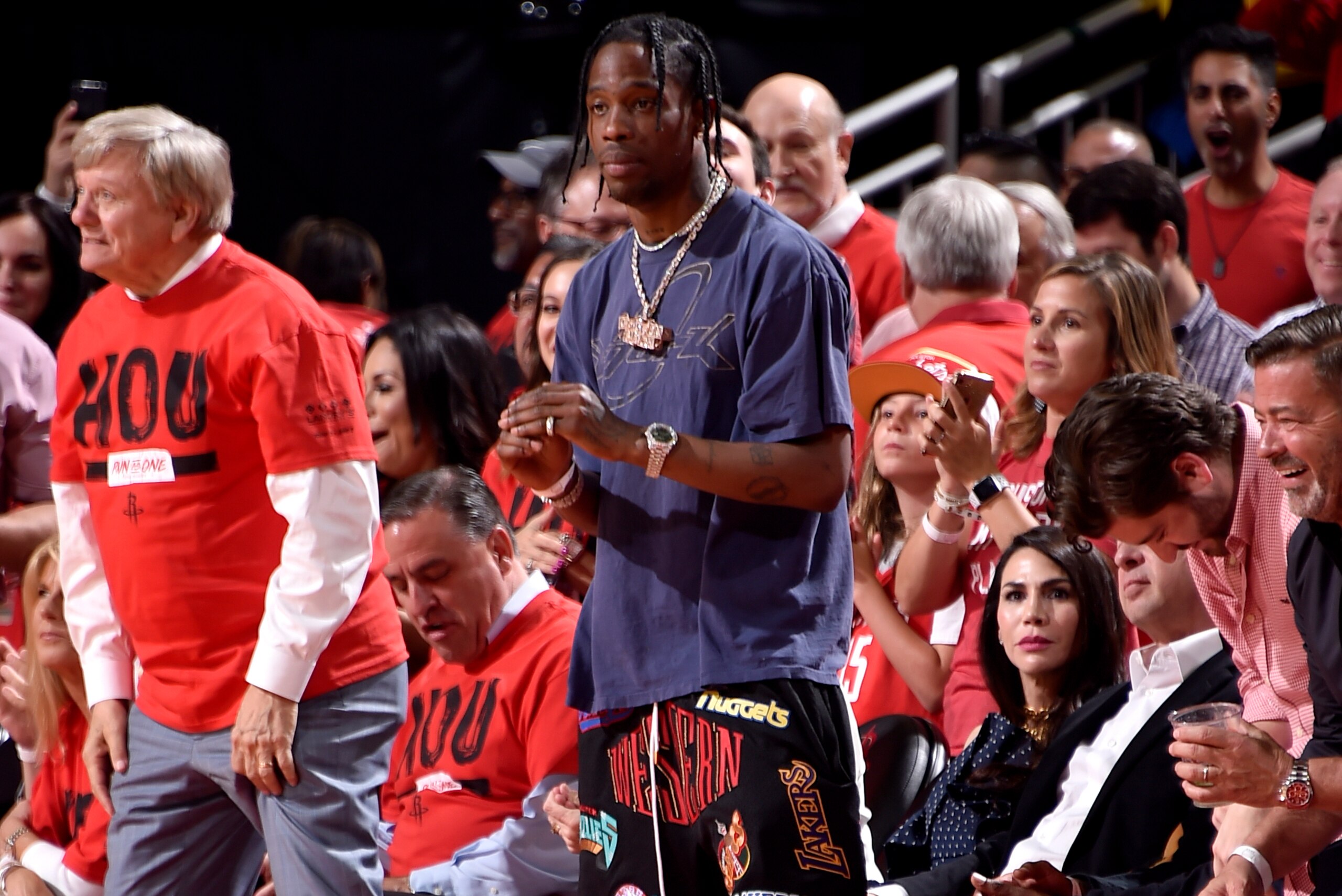HOUSTON, TX - MAY 16:  Travis Scott looks on during the game between the Houston Rockets and the Golden State Warriors in Game Two of the Western Conference Finals of the 2018 NBA Playoffs on May 16, 2018 at the Toyota Center in Houston, Texas. NOTE TO US