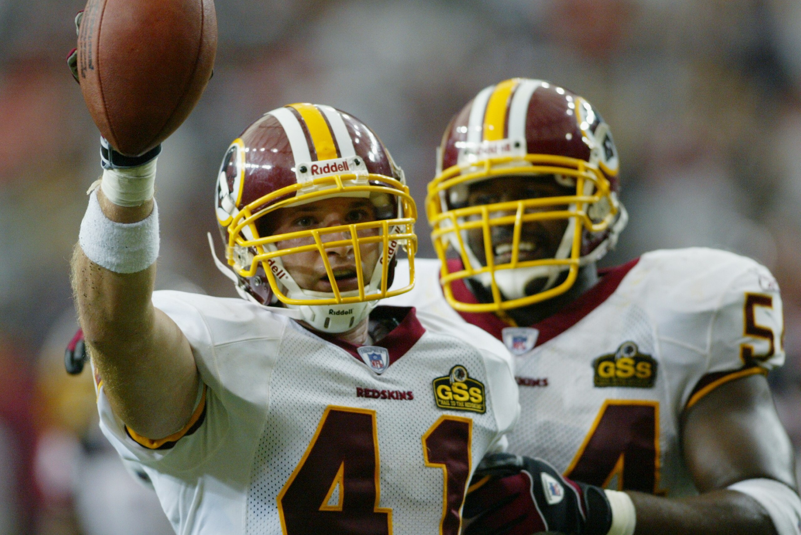 ATLANTA - SEPTEMBER 14:  Matt Bowen #41 of the Washington Redskins celebrates with Jeremiah Trotter #54 after Bowen intercepted a pass against the Atlanta Falcons on September 14, 2003 at the Georgia Dome in Atlanta, Georgia. The Redskins defeated the Fal