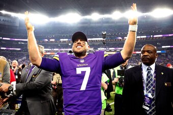 MINNEAPOLIS, MN - JANUARY 14:  Quarterback Case Keenum #7 of the Minnesota Vikings celebrates as he walks off the field after the Vikings defeated the New Orleans Saints 29-24 to win the NFC divisional round playoff game at U.S. Bank Stadium on January 14
