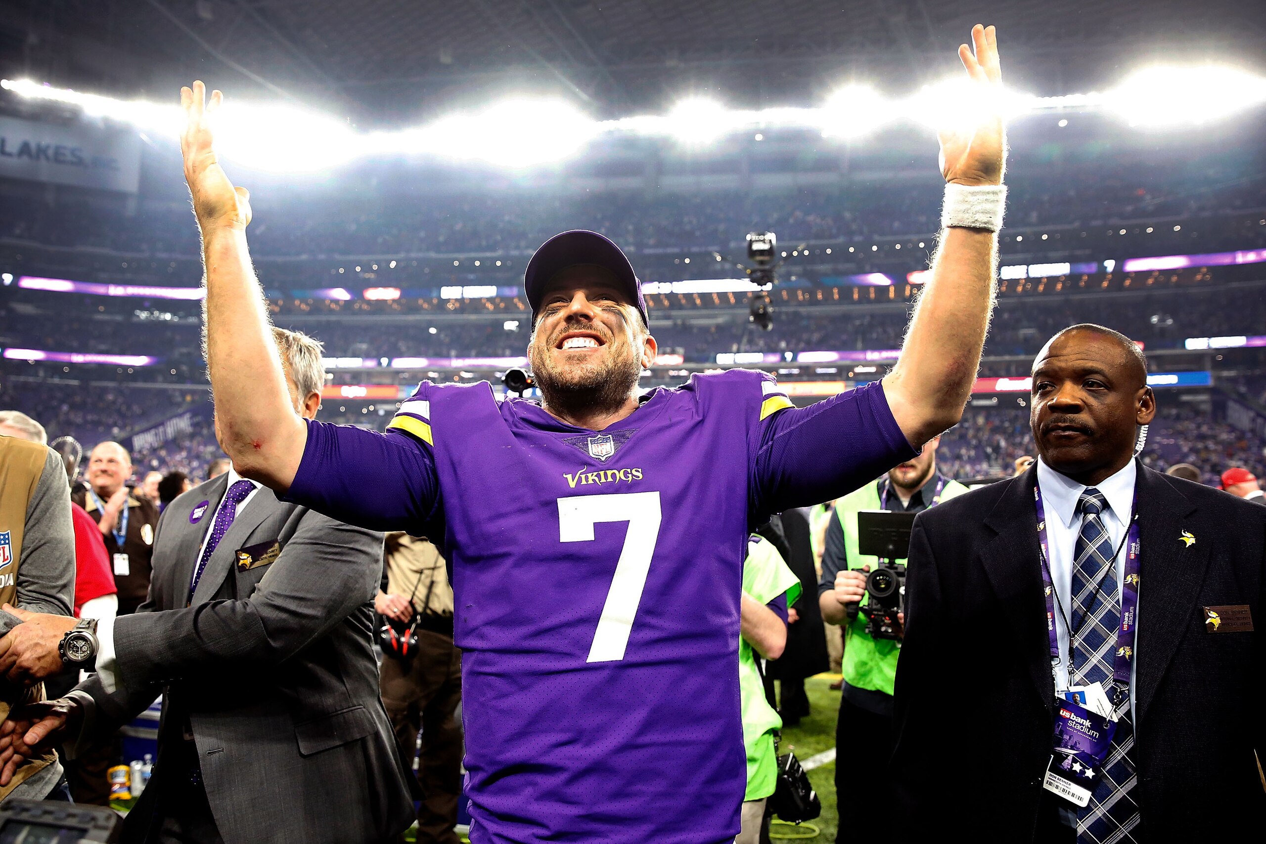 MINNEAPOLIS, MN - JANUARY 14:  Quarterback Case Keenum #7 of the Minnesota Vikings celebrates as he walks off the field after the Vikings defeated the New Orleans Saints 29-24 to win the NFC divisional round playoff game at U.S. Bank Stadium on January 14