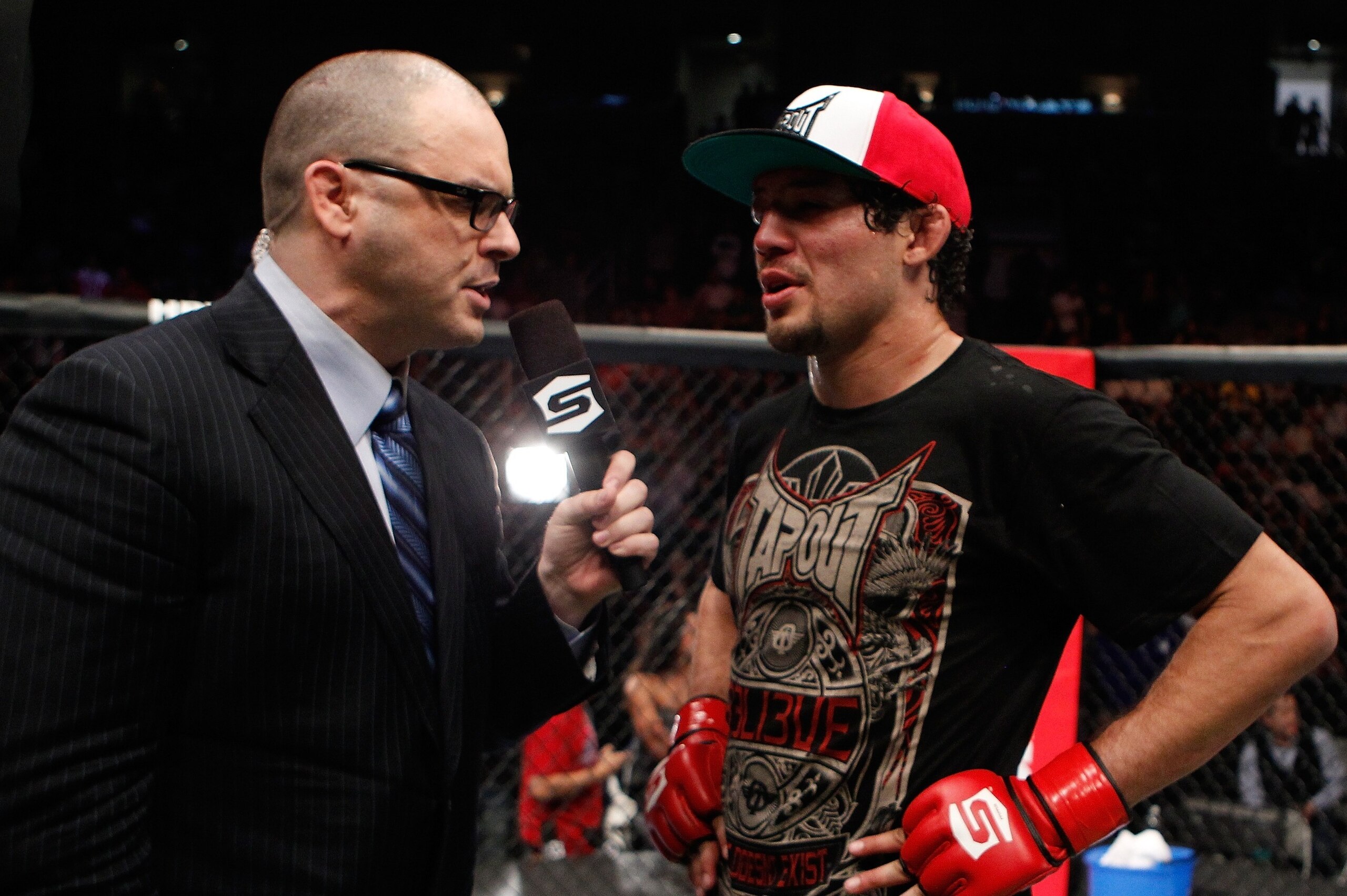 SAN JOSE, CA - MAY 19:  (L-R) Mauro Ranallo interviews Gilbert Melendez after his win over Josh Thomson during the Strikeforce event at HP Pavilion on May 19, 2012 in San Jose, California.  (Photo by Esther Lin/Forza LLC/Zuffa LLC via Getty Images)