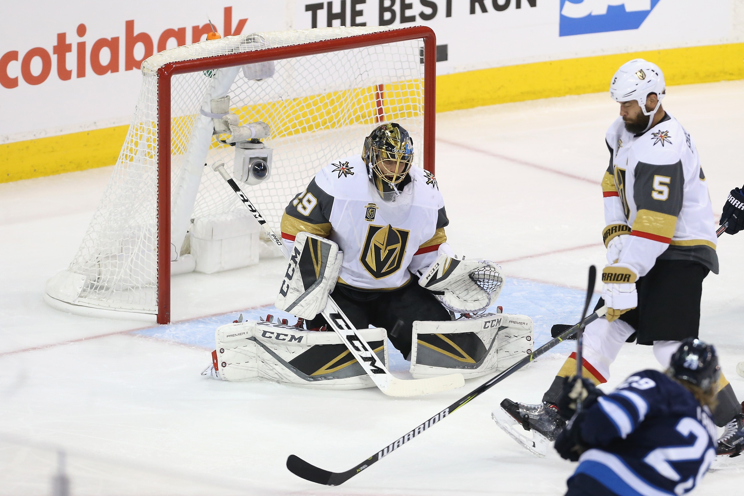 WINNIPEG, MB - MAY 20: Marc-Andre Fleury #29 of the Vegas Golden Knights makes a save during the first period against the Winnipeg Jets in Game Five of the Western Conference Finals during the 2018 NHL Stanley Cup Playoffs at Bell MTS Place on May 20, 20 WINNIPEG, MB - MAY 20: Marc-Andre Fleury #29 of the Vegas Golden Knights makes a save during the first period against the Winnipeg Jets in Game Five of the Western Conference Finals during the 2018 NHL Stanley Cup Playoffs at Bell MTS Place on May 20, 20
