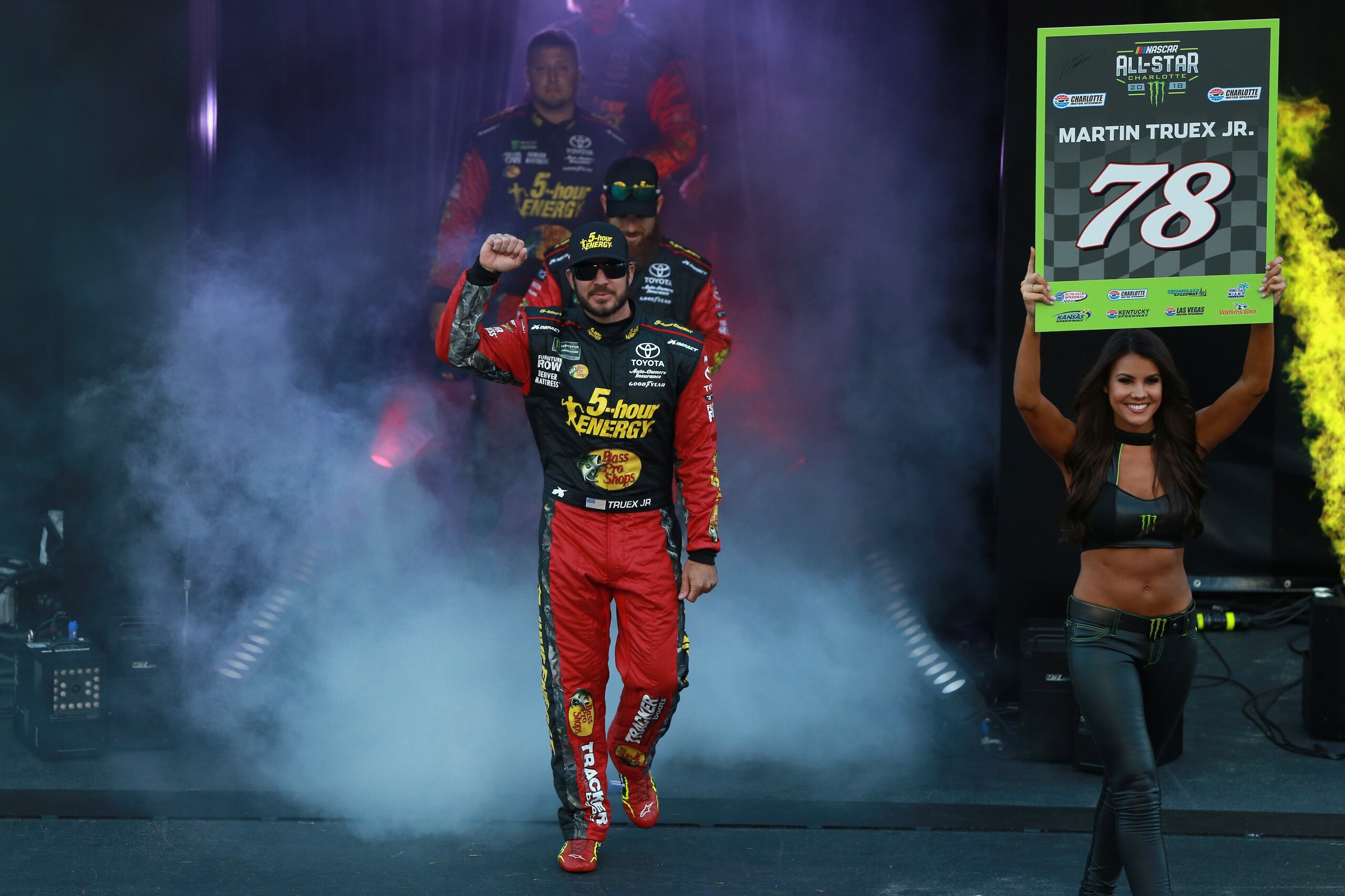 CHARLOTTE, NORTH CAROLINA - MAY 19: Martin Truex Jr., driver of the #78 5-hour Energy/Bass Pro Shops Toyota, waves to the crowd during the pre-race ceremonies for the Monster Energy NASCAR Cup Series All-Star Race at Charlotte Motor Speedway on May 19, 2 CHARLOTTE, NORTH CAROLINA - MAY 19: Martin Truex Jr., driver of the #78 5-hour Energy/Bass Pro Shops Toyota, waves to the crowd during the pre-race ceremonies for the Monster Energy NASCAR Cup Series All-Star Race at Charlotte Motor Speedway on May 19, 2