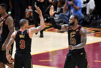 CLEVELAND, OH - MAY 25: George Hill #3 and LeBron James #23 of the Cleveland Cavaliers celebrate after a play in the second half against the Boston Celtics during Game Six of the 2018 NBA Eastern Conference Finals at Quicken Loans Arena on May 25, 2018 in