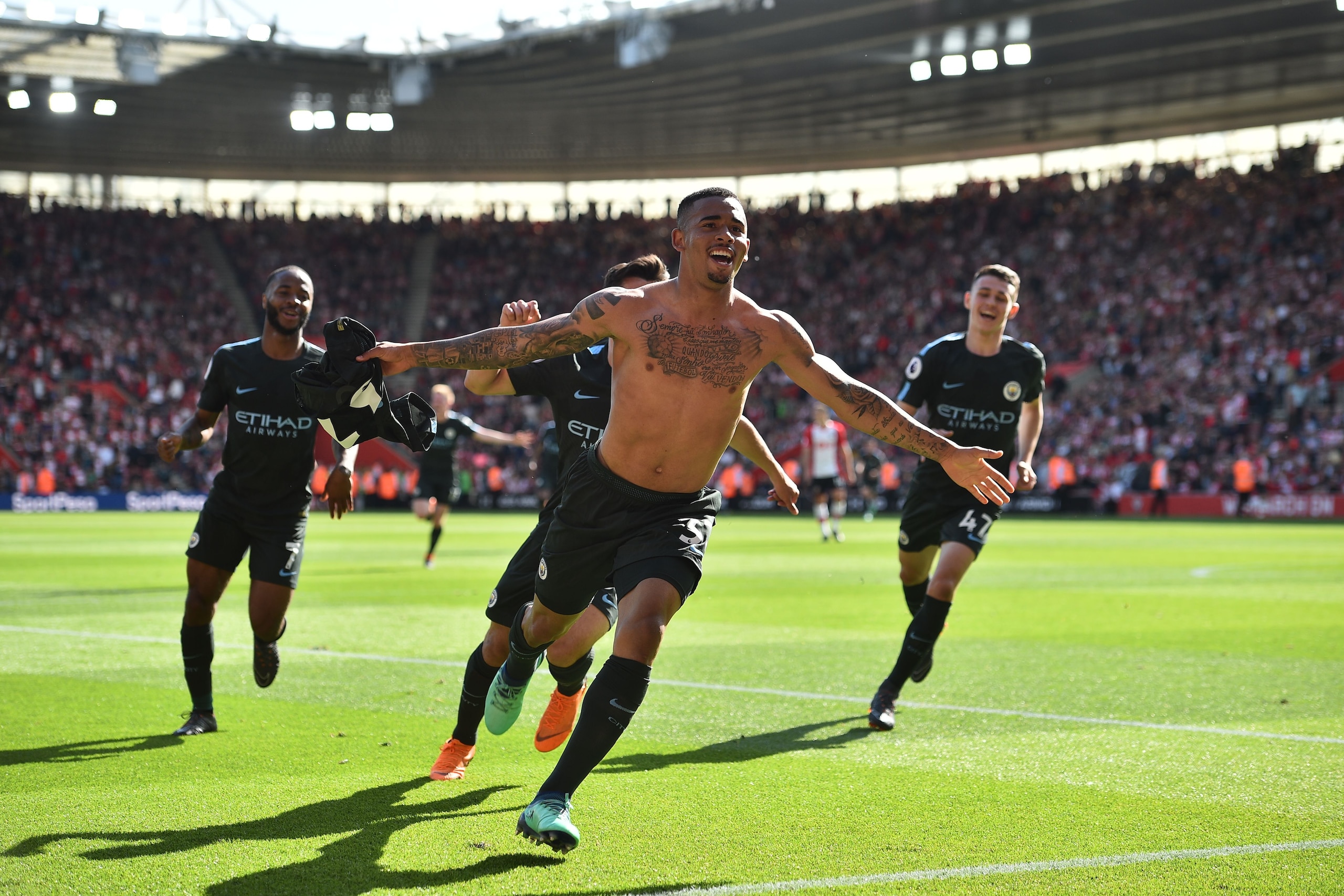 Manchester City's Brazilian striker Gabriel Jesus celebrates scoring the opening goal during the English Premier League football match between Southampton and Manchester City at St Mary's Stadium in Southampton, southern England on May 13, 2018. (Photo by