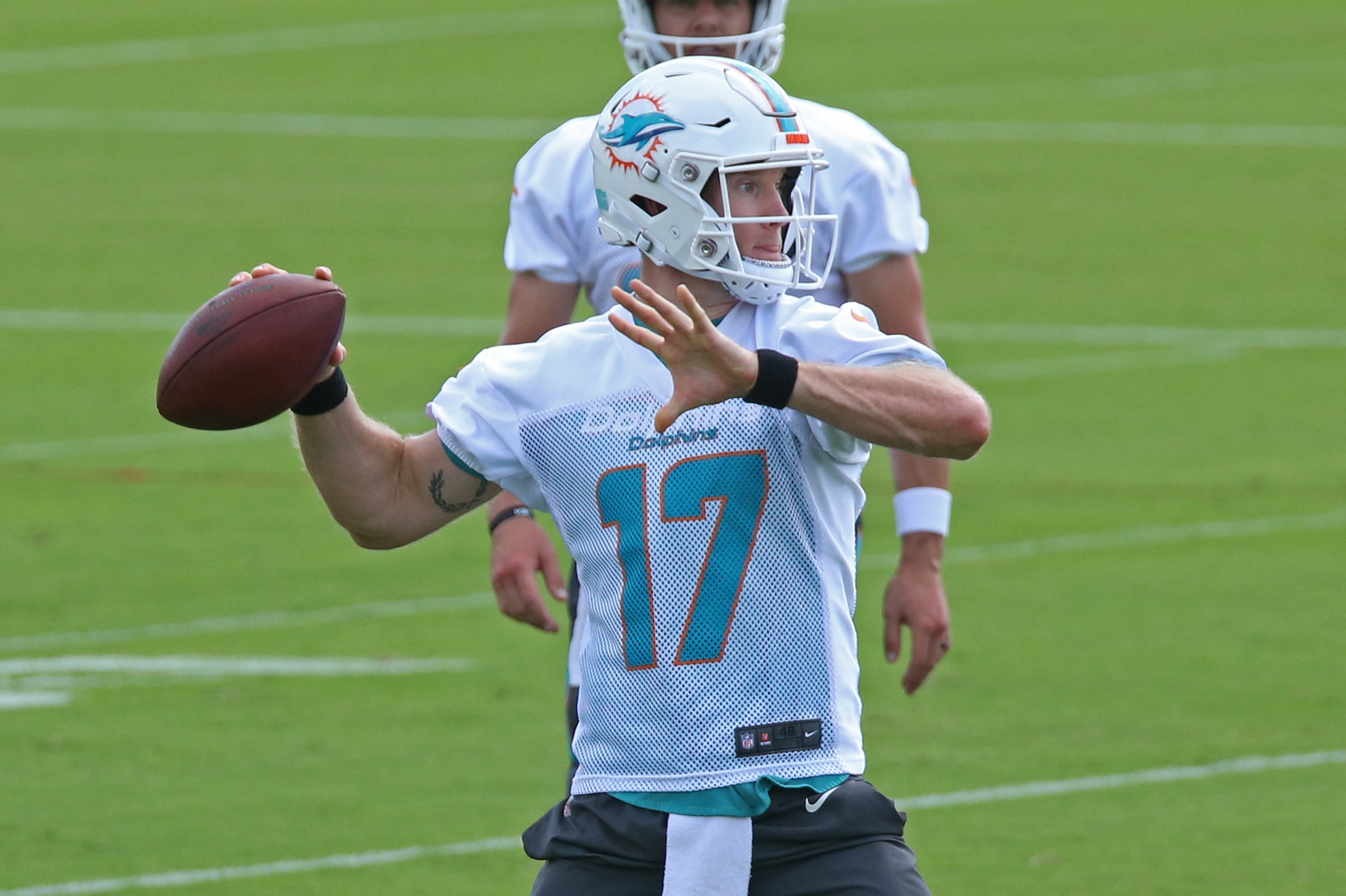 DAVIE, FL - MAY 23: Ryan Tannehill #17 of the Miami Dolphins throws the ball during the teams training camp on May 23, 2018 at the Miami Dolphins training facility in Davie, Florida. (Photo by Joel Auerbach/Getty Images)