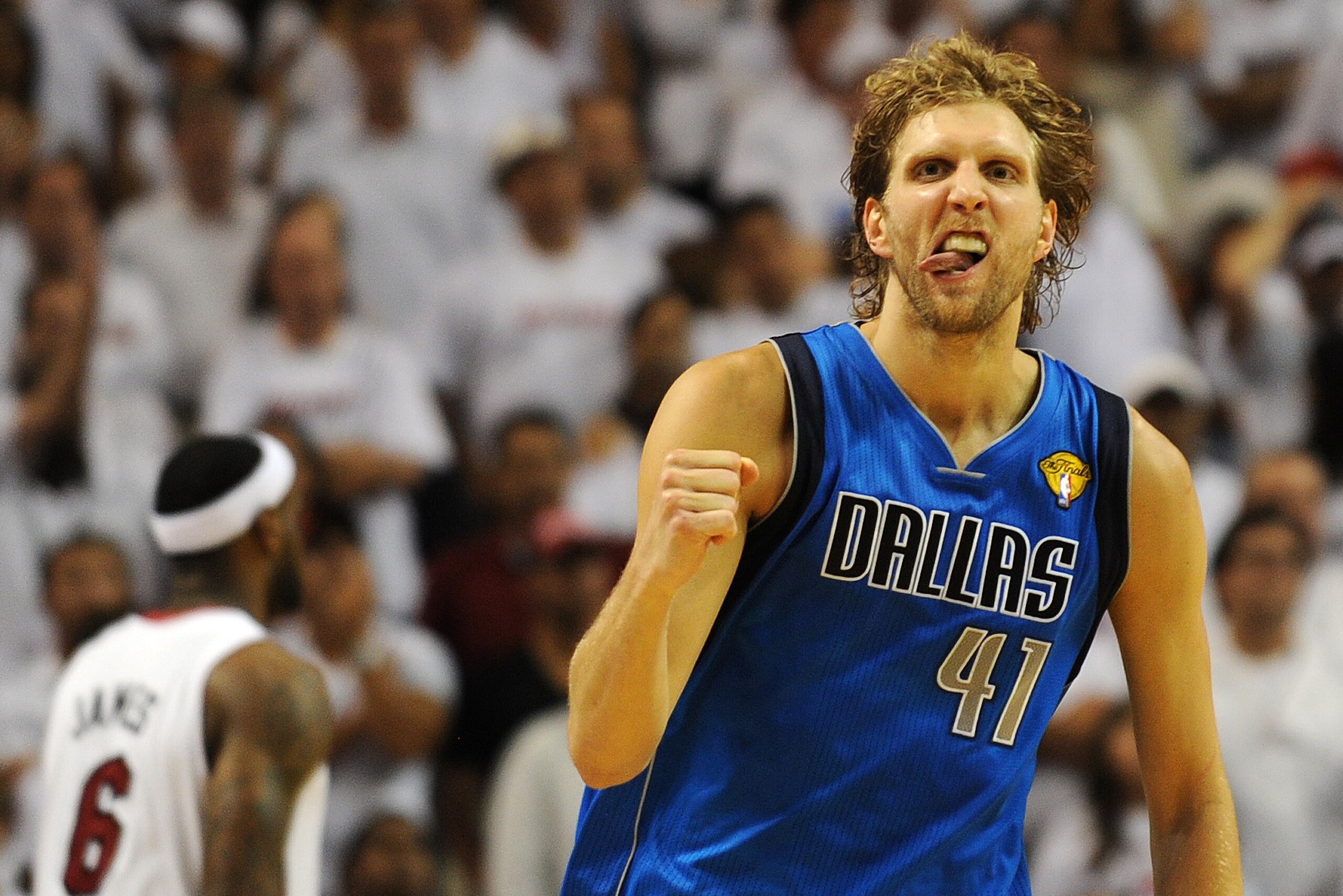 Dirk Nowitzki of the Dallas Mavericks celebrates a point against the Miami Heat in Game 6 of the NBA Finals on June 12, 2011 at the AmericanAirlines Arena in Miami, Florida. Jason Terry scored 27 points and Nowitzki finished with 21 points and 11 reboun Dirk Nowitzki of the Dallas Mavericks celebrates a point against the Miami Heat in Game 6 of the NBA Finals on June 12, 2011 at the AmericanAirlines Arena in Miami, Florida. Jason Terry scored 27 points and Nowitzki finished with 21 points and 11 reboun