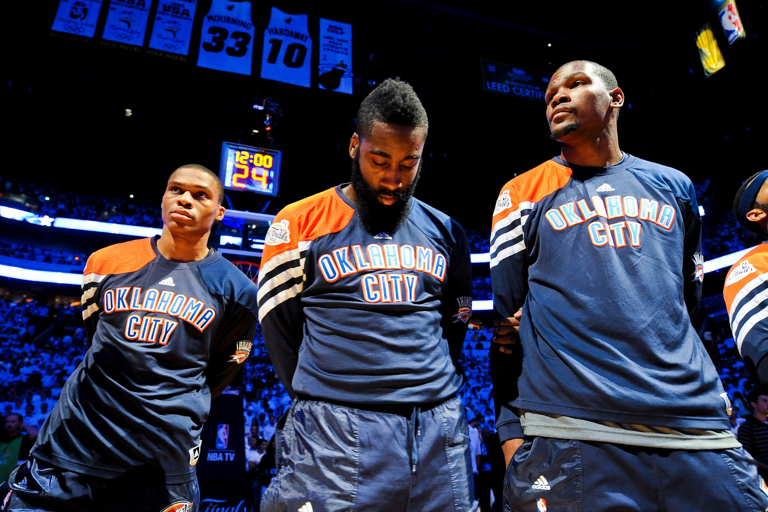 MIAMI, FL - JUNE 17: Oklahoma City Thunder players, from left, Russell Westbrook #0, James Harden #13 and Kevin Durant #35 listen during the National Anthem before facing the Miami Heat in Game Three of the 2012 NBA Finals at American Airlines Arena on Ju MIAMI, FL - JUNE 17: Oklahoma City Thunder players, from left, Russell Westbrook #0, James Harden #13 and Kevin Durant #35 listen during the National Anthem before facing the Miami Heat in Game Three of the 2012 NBA Finals at American Airlines Arena on Ju