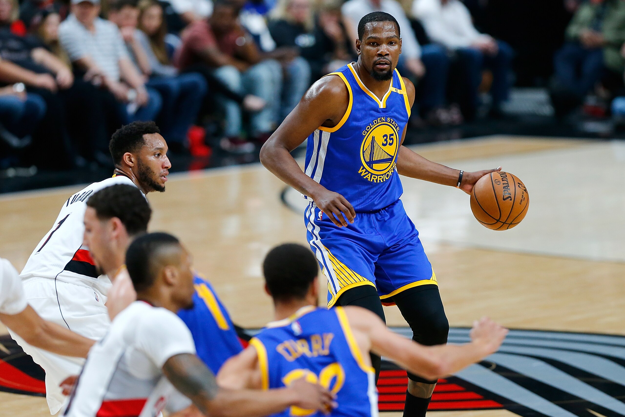 PORTLAND, OR - APRIL 24: Kevin Durant #35 of the Golden State Warriors bribbles the ball against the Portland Trail Blazers during Game Four of the Western Conference Quarterfinals of the 2017 NBA Playoffs at Moda Center on April 24, 2017 in Portland, O PORTLAND, OR - APRIL 24: Kevin Durant #35 of the Golden State Warriors bribbles the ball against the Portland Trail Blazers during Game Four of the Western Conference Quarterfinals of the 2017 NBA Playoffs at Moda Center on April 24, 2017 in Portland, O