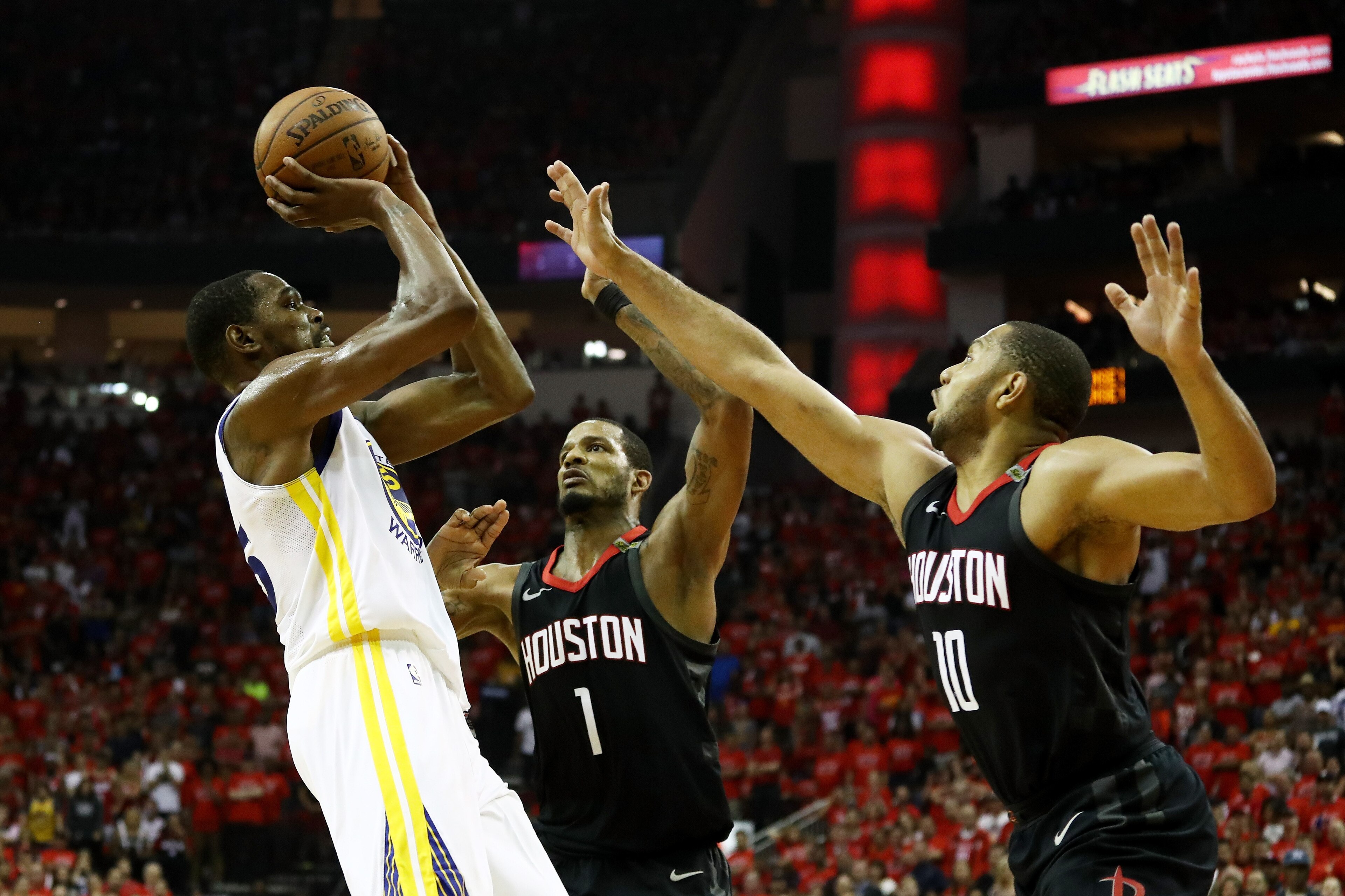 HOUSTON, TX - MAY 28: Kevin Durant #35 of the Golden State Warriors shoots against Trevor Ariza #1 and Eric Gordon #10 of the Houston Rockets in the third quarter of Game Seven of the Western Conference Finals of the 2018 NBA Playoffs at Toyota Center on HOUSTON, TX - MAY 28: Kevin Durant #35 of the Golden State Warriors shoots against Trevor Ariza #1 and Eric Gordon #10 of the Houston Rockets in the third quarter of Game Seven of the Western Conference Finals of the 2018 NBA Playoffs at Toyota Center on
