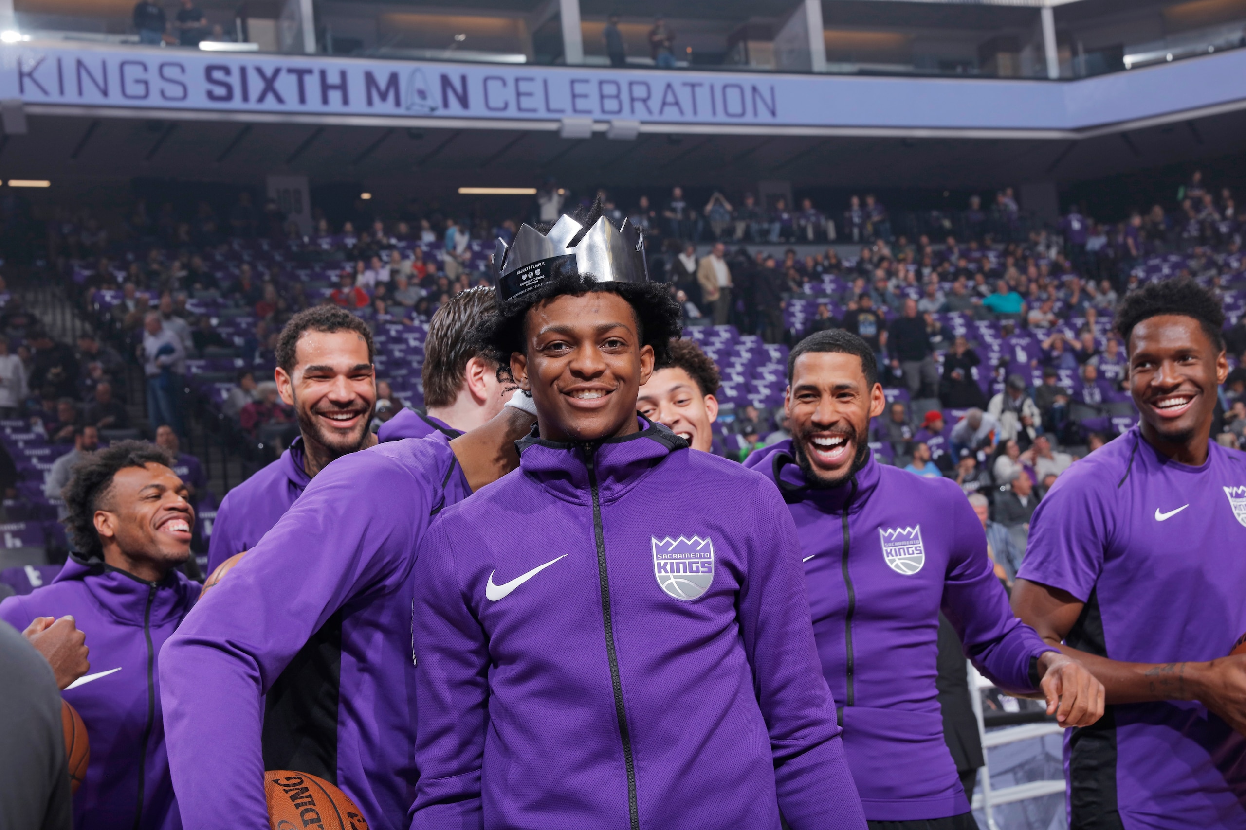 SACRAMENTO, CA - APRIL 11: De'Aaron Fox #5 of the Sacramento Kings wears the Oscar Robertson Triple- Double Award belonging to Garrett Temple #17 prior to the game against the Houston Rockets on April 11, 2018 at Golden 1 Center in Sacramento, California.