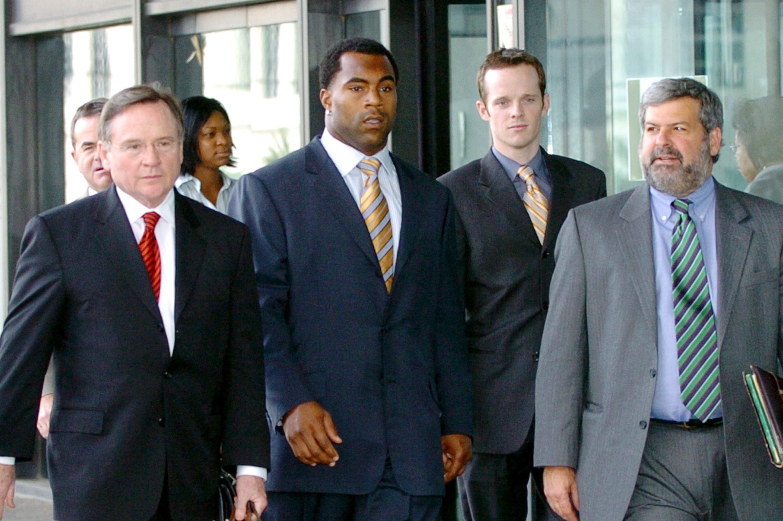 Lewis with lawyers in 2004