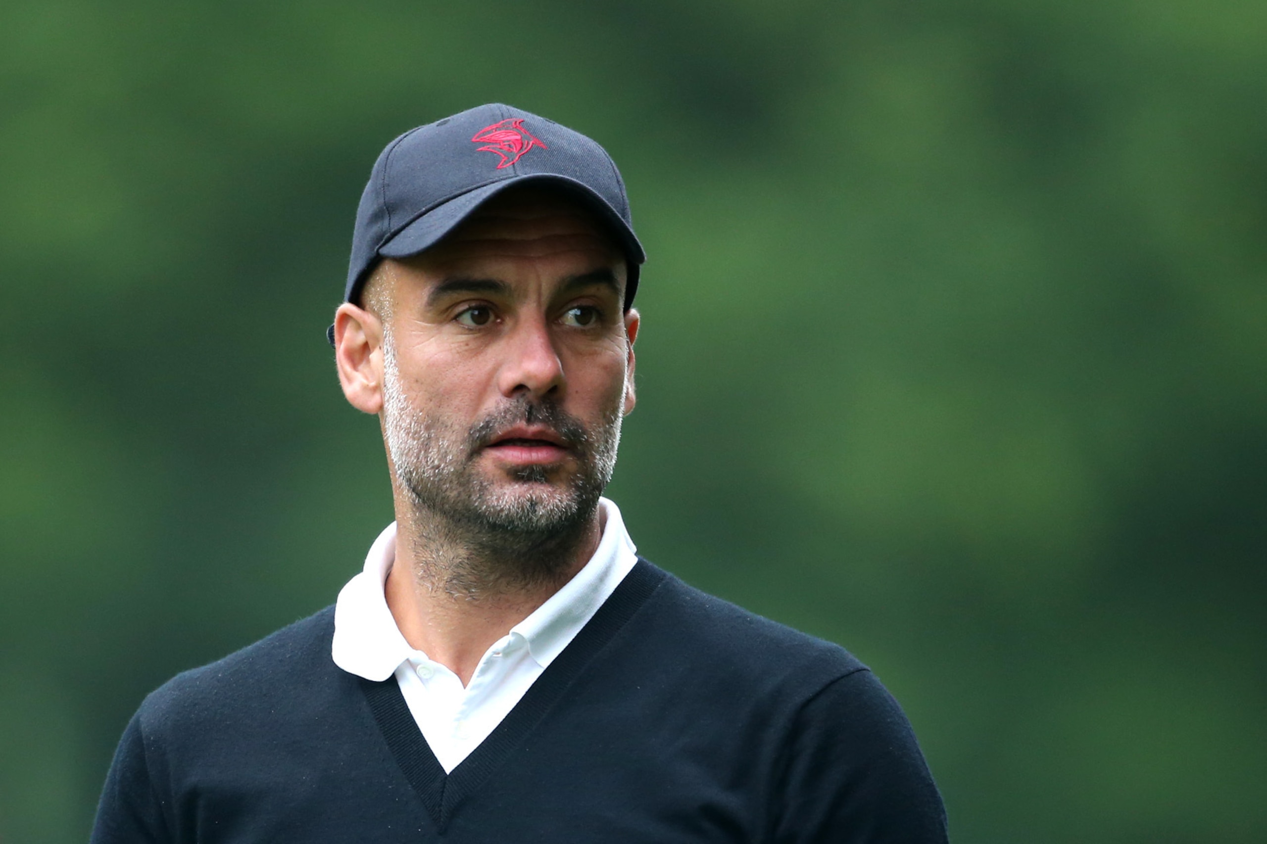 VIRGINIA WATER, ENGLAND - MAY 23:  Pep Guardiola looks on during the Pro Am for the BMW PGA Championship at Wentworth on May 23, 2018 in Virginia Water, England.  (Photo by Alex Pantling/Getty Images)