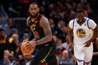 CLEVELAND, OH - JANUARY 15: LeBron James #23 of the Cleveland Cavaliers brings the ball up court during the game against the Golden State Warriors at Quicken Loans Arena on January 15, 2018 in Cleveland, Ohio. NOTE TO USER: User expressly acknowledges and