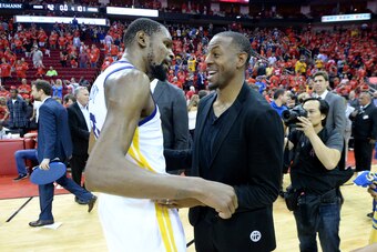 HOUSTON, TX - MAY 28: Kevin Durant #35 and Andre Iguodala #9 of the Golden State Warriors talk after Game Seven of the Western Conference Finals against the Houston Rockets during the 2018 NBA Playoffs on May 28, 2018 at the Toyota Center in Houston, Texa