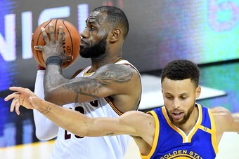 CLEVELAND, OH - JUNE 09: LeBron James #23 of the Cleveland Cavaliers handles the ball against Stephen Curry #30 of the Golden State Warriors in the fourth quarter in Game 4 of the 2017 NBA Finals at Quicken Loans Arena on June 9, 2017 in Cleveland, Ohio. 
