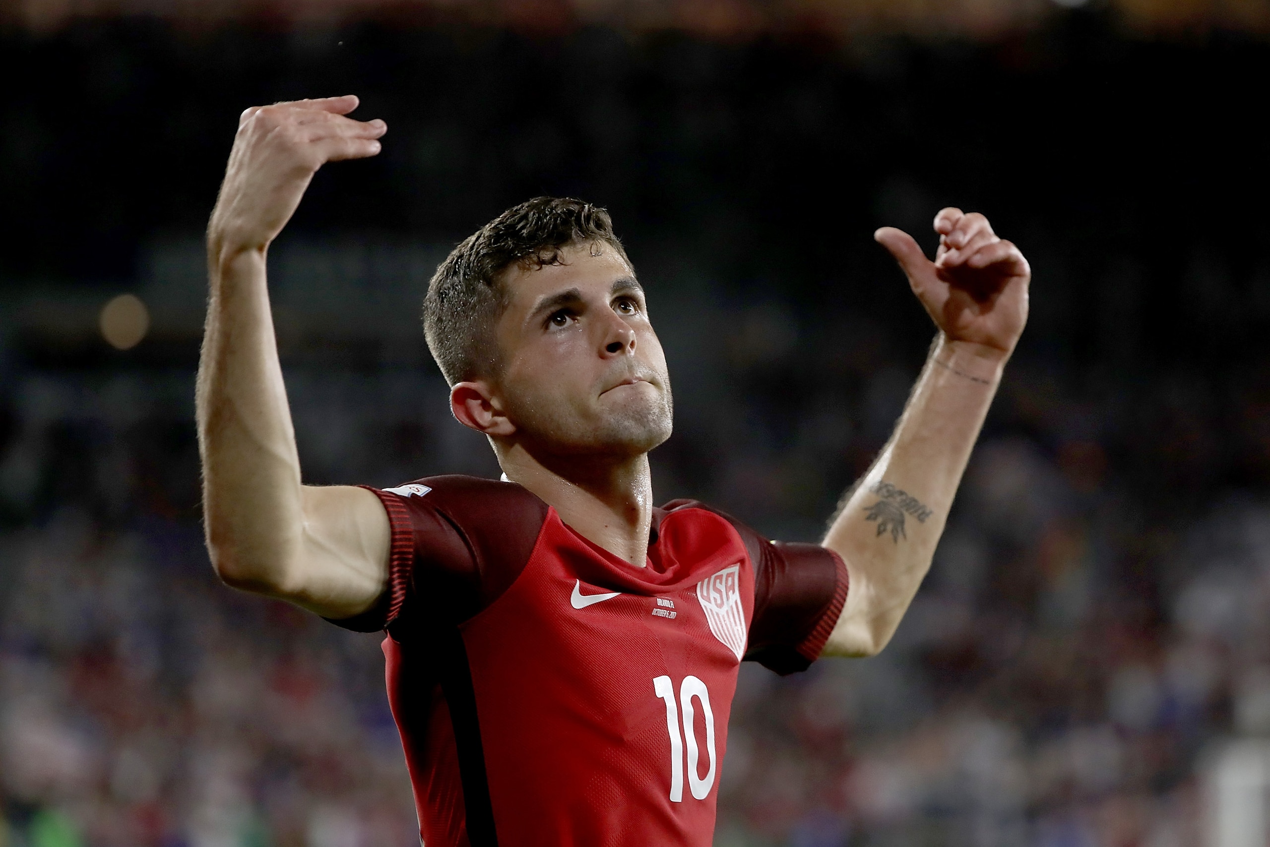 ORLANDO, FL - OCTOBER 06:  Christian Pulisic #10 of the United States reacts after scoring a goal during the final round qualifying match against Panama for the 2018 FIFA World Cup at Orlando City Stadium on October 6, 2017 in Orlando, Florida.  (Photo by