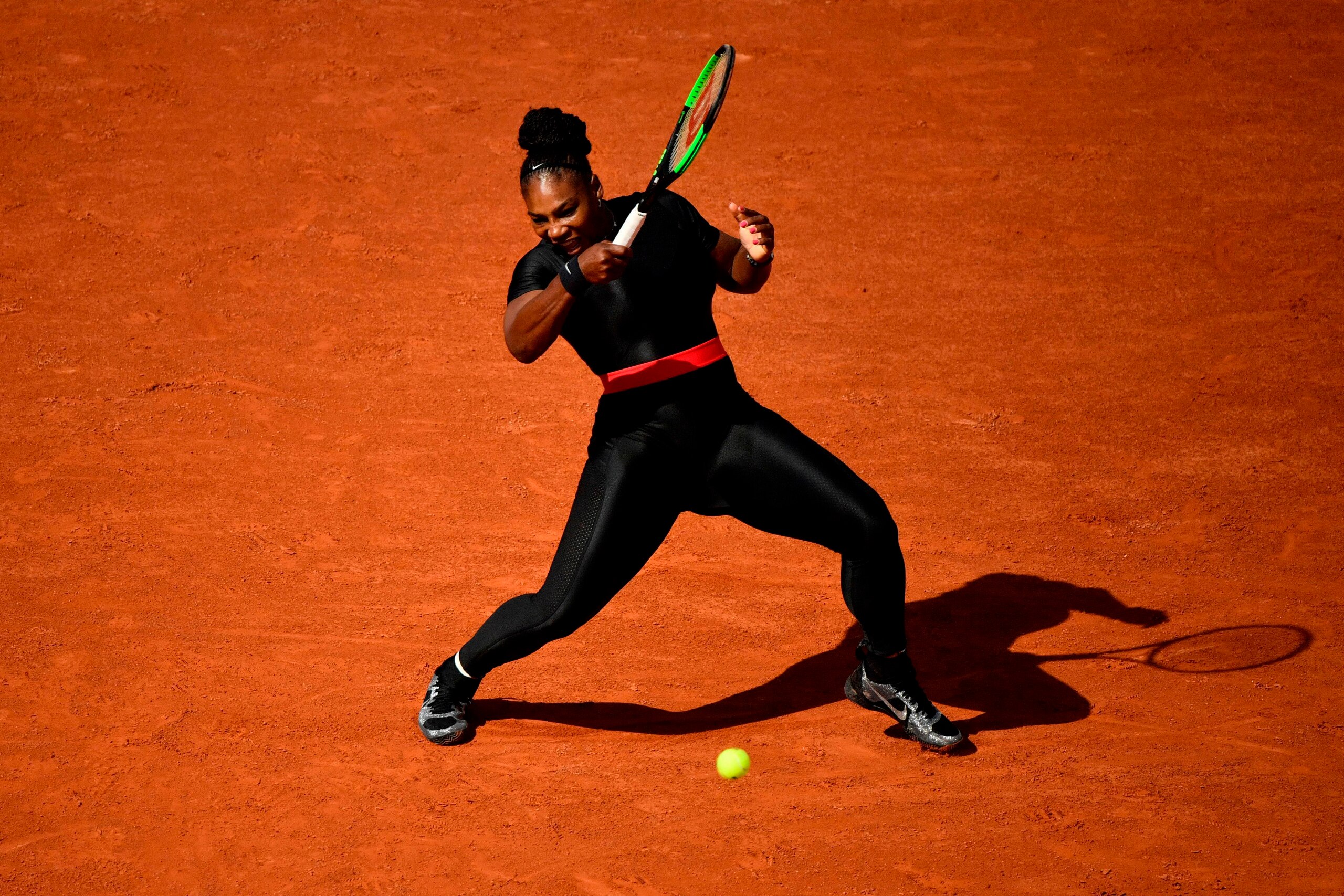 TOPSHOT - Serena Williams of the US plays a forehand return to Czech Republic's Kristyna Pliskova during their women's singles first round match on day three of The Roland Garros 2018 French Open tennis tournament in Paris on May 29, 2018. (Photo by CHRIS TOPSHOT - Serena Williams of the US plays a forehand return to Czech Republic's Kristyna Pliskova during their women's singles first round match on day three of The Roland Garros 2018 French Open tennis tournament in Paris on May 29, 2018. (Photo by CHRIS
