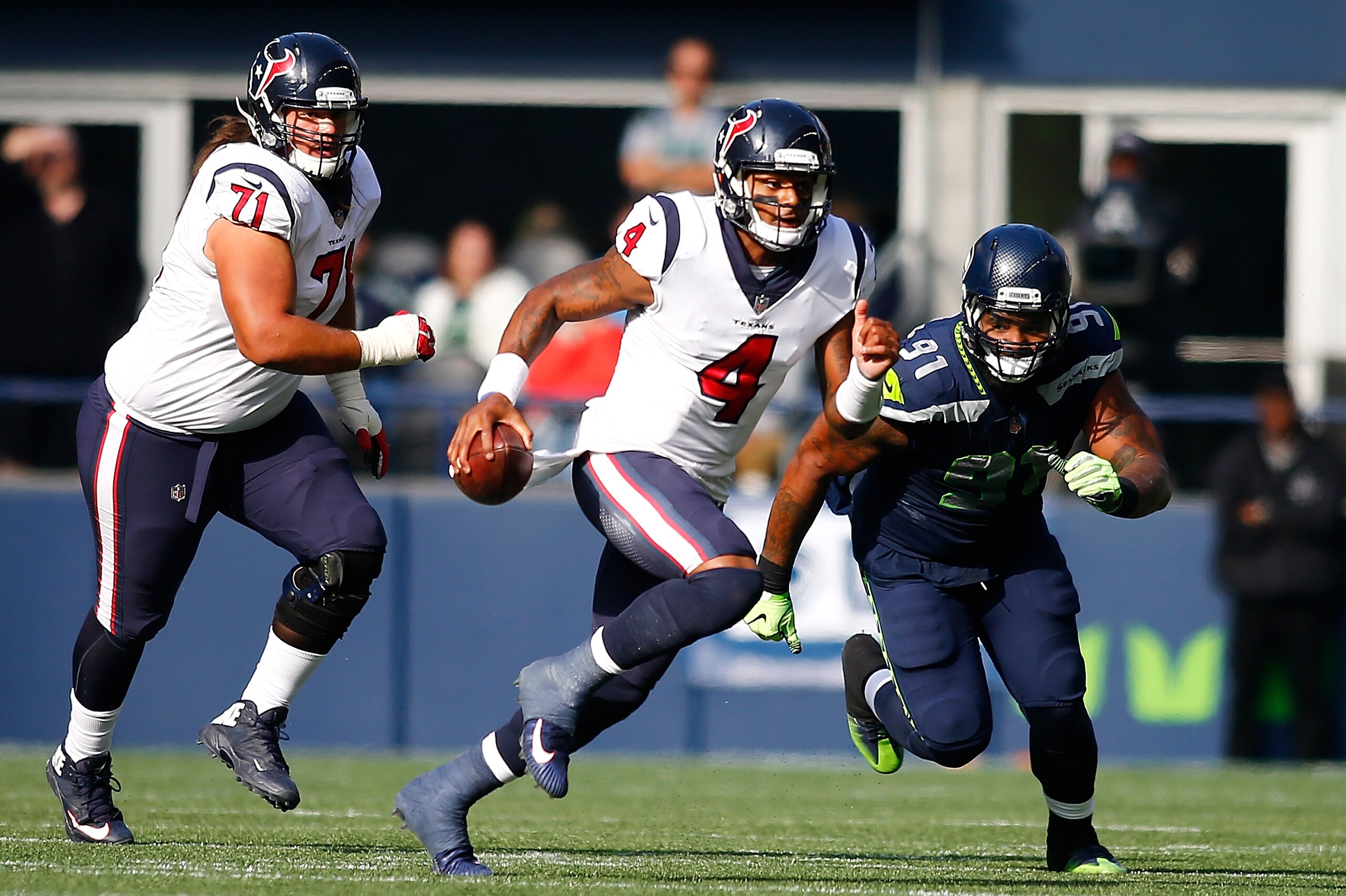 SEATTLE, WA - OCTOBER 29:  DeShaun Watson #4 of the Houston Texans runs the ball against the Seattle Seahawks at CenturyLink Field on October 29, 2017 in Seattle, Washington.  (Photo by Jonathan Ferrey/Getty Images)