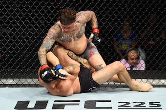 UTICA, NY - JUNE 01:  (R-L) Gregor Gillespie punches Vinc Pichel in their lightweight fight during the UFC Fight Night event at the Adirondack Bank Center on June 1, 2018 in Utica, New York. (Photo by Josh Hedges/Zuffa LLC/Zuffa LLC via Getty Images)