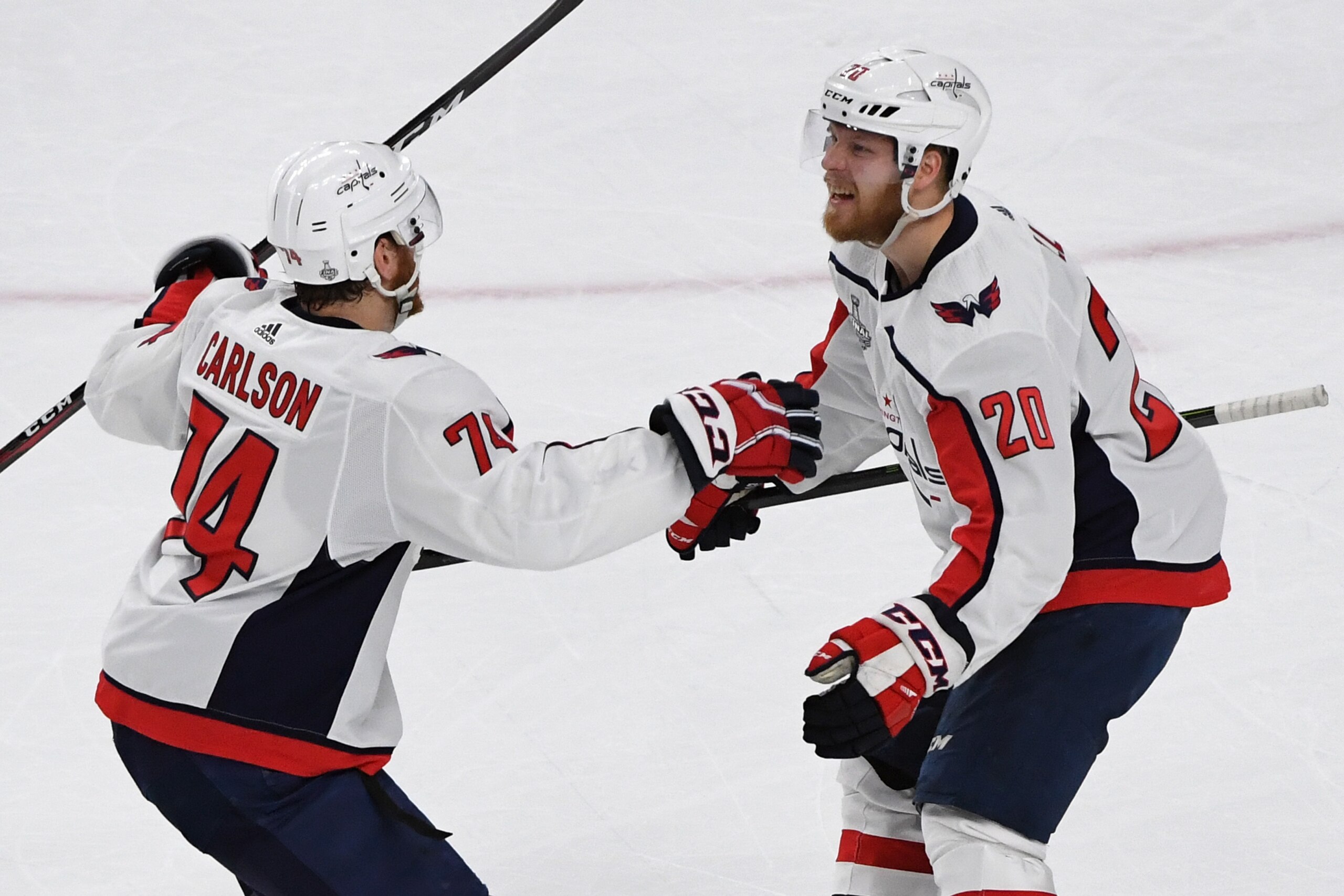 LAS VEGAS, NV - MAY 30:  John Carlson #74 and Lars Eller #20 of the Washington Capitals celebrate after Eller scored a first-period goal against the Vegas Golden Knights in Game Two of the 2018 NHL Stanley Cup Final at T-Mobile Arena on May 30, 2018 in La