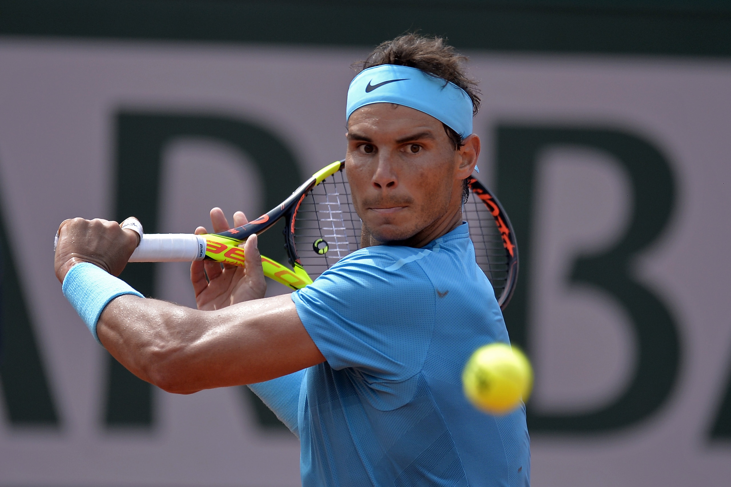 PARIS, FRANCE - JUNE 04:  Rafael Nadal of Spain plays a backhand during his men's singles fourth round match against Maximilian Marterer of Germany on day 9 of the 2018 French Open at Roland Garros on June 4, 2018 in Paris, France.  (Photo by Aurelien Meu